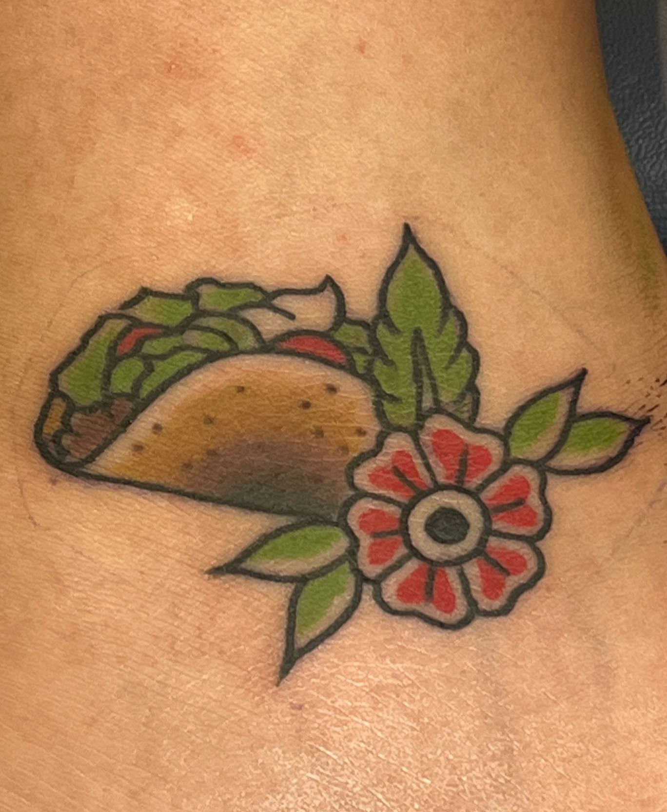 Taco and flower American traditional tattoo on the thigh by TYP 419, Toledo, Ohio