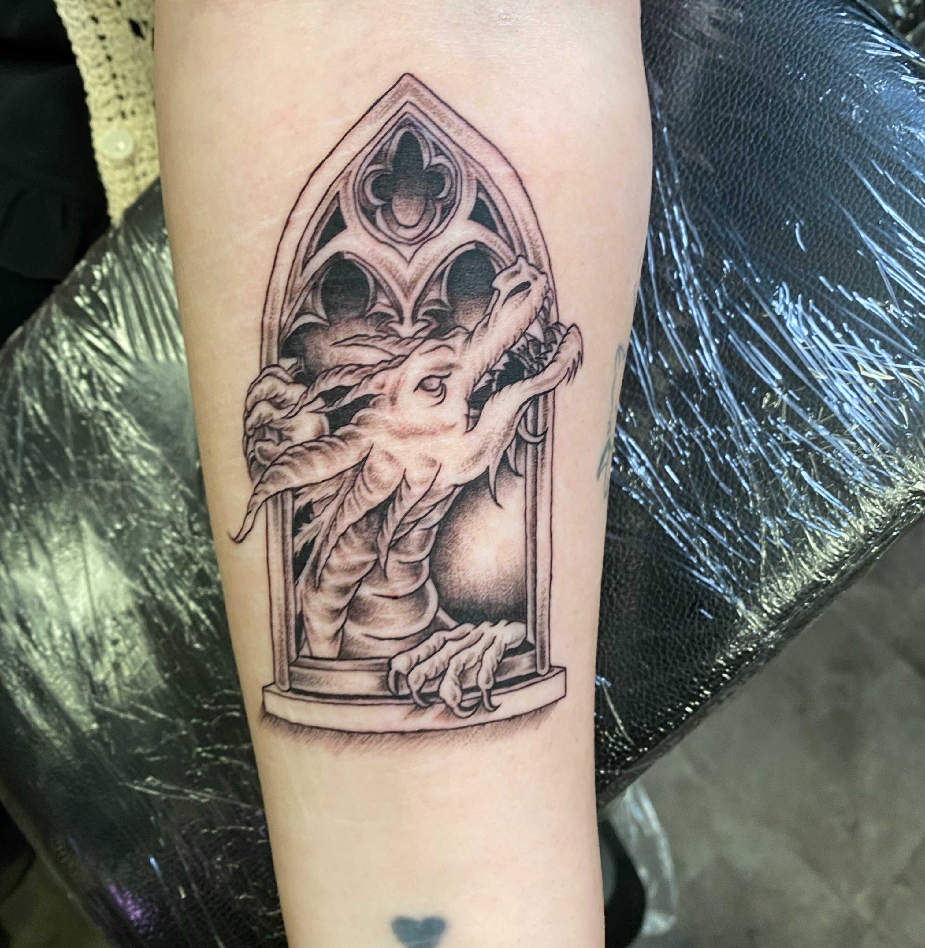 Dragon realism tattoo on the forearm by Mack ๐ Utah Tattoos