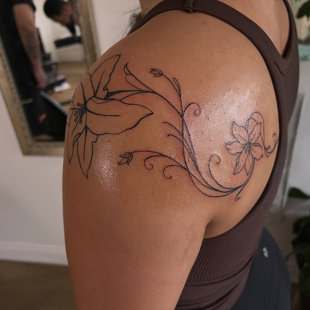 Floral vine fine line tattoo on the shoulder by Juan pablo, Toronto, Ontario