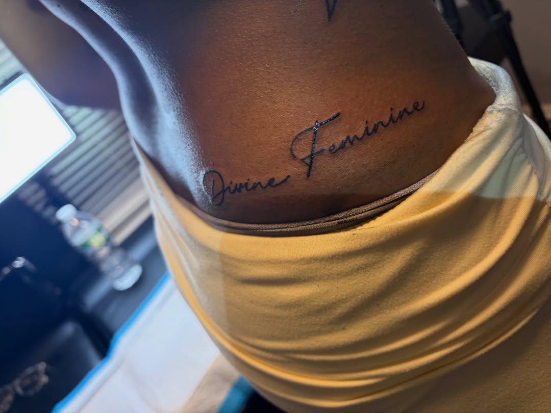 Divine feminine lettering script tattoo on the neck by Khemar InspiredByLife 🇯🇲