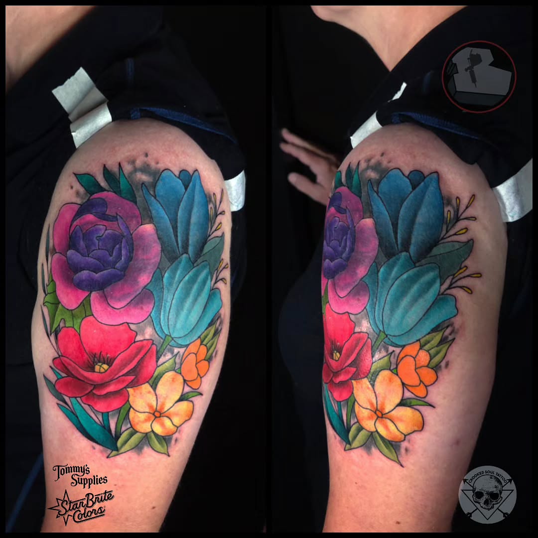 Floral bouquet American traditional tattoo on the thigh by Buk