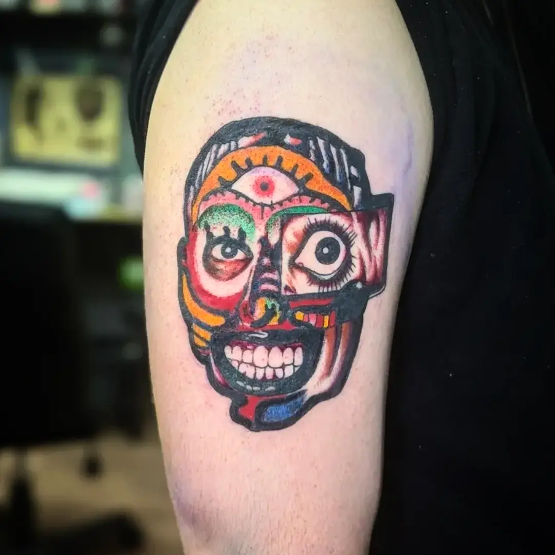 Clown face American traditional tattoo on the forearm by joseph palladino