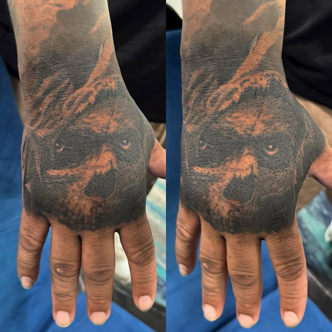 Wolf dark realism tattoo on the hand by marcus labonne