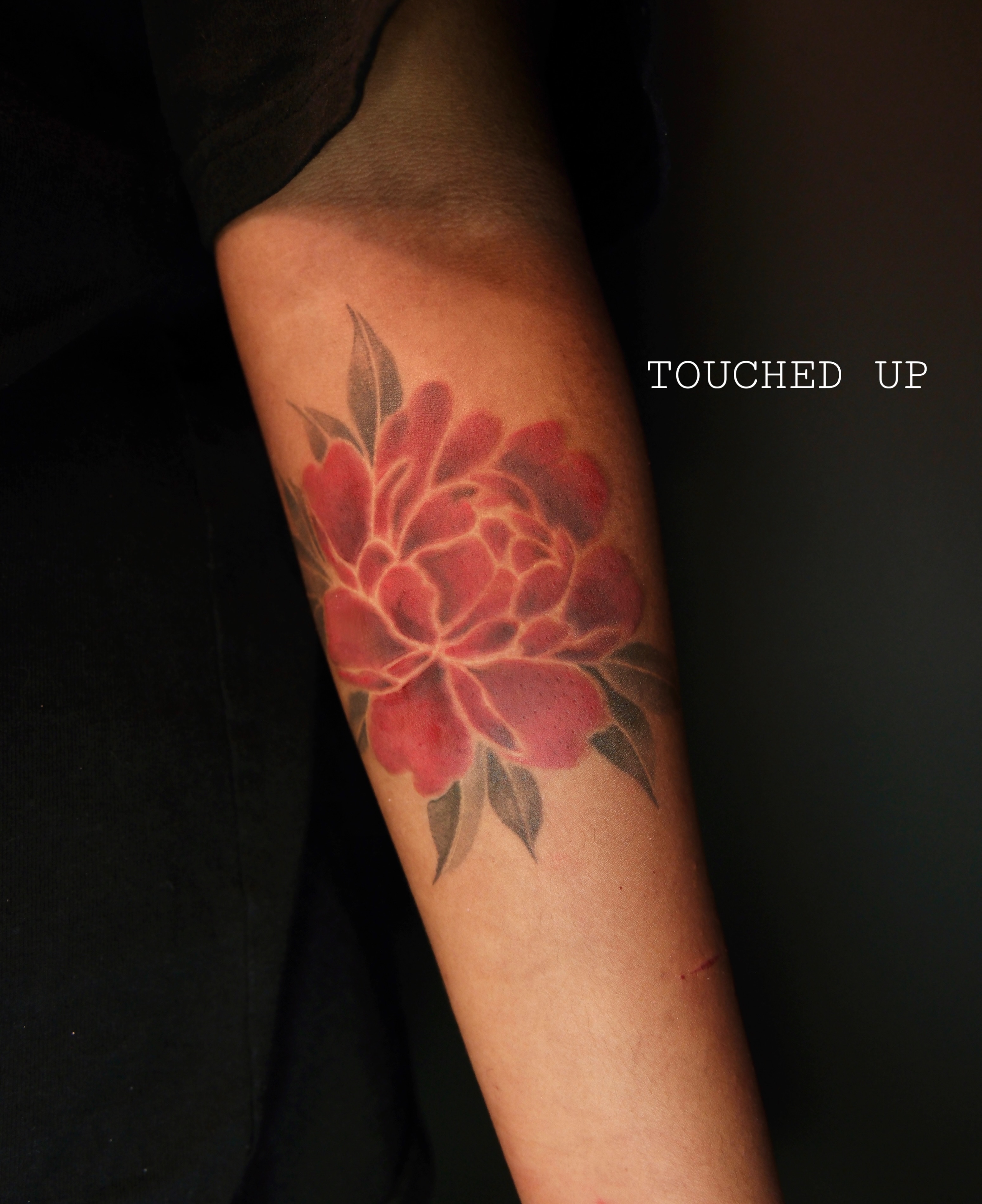 Peony realism tattoo on the forearm by Vu Nguyen