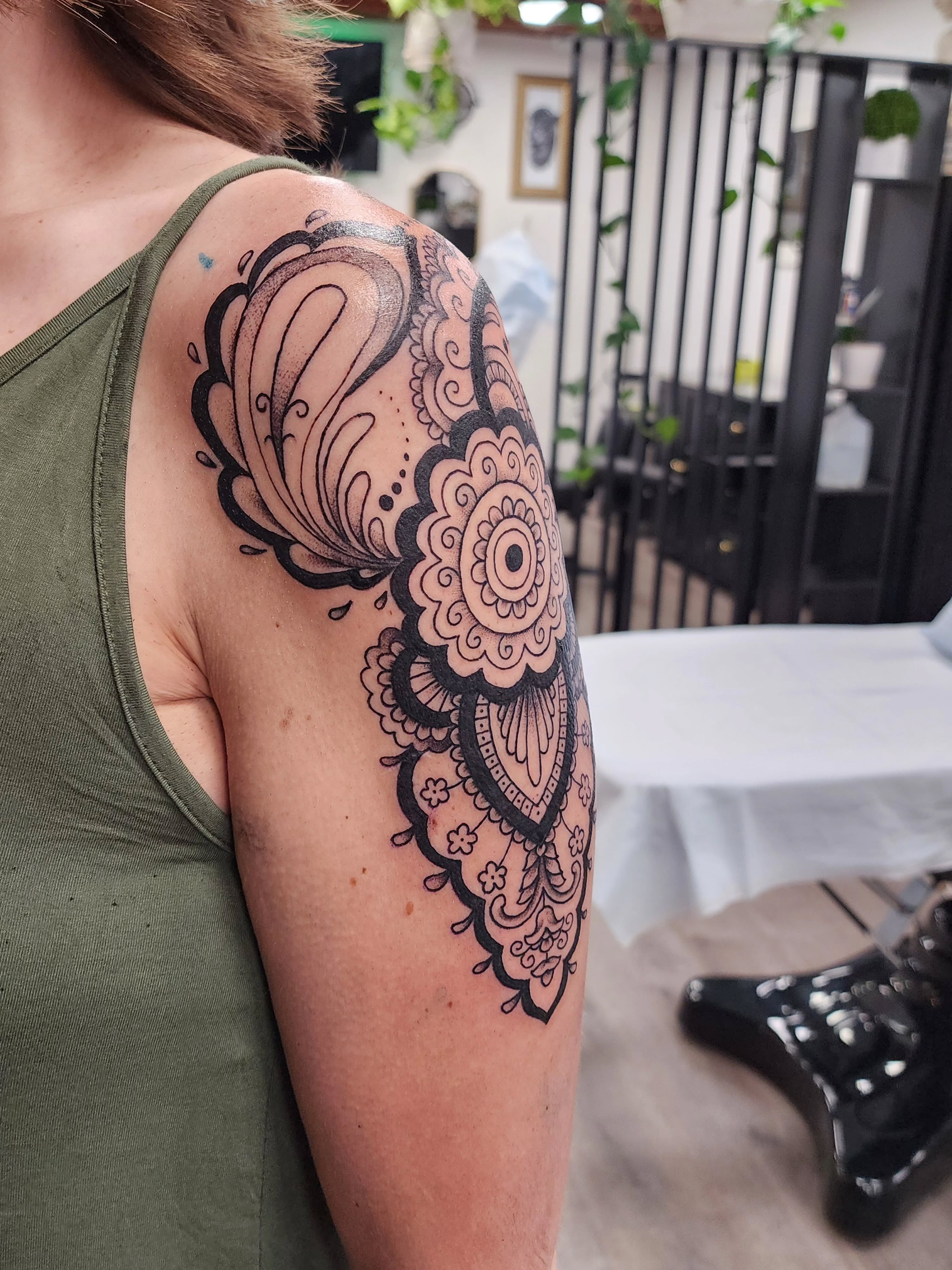 Mandala ornamental tattoo on the upper arm by mikayla