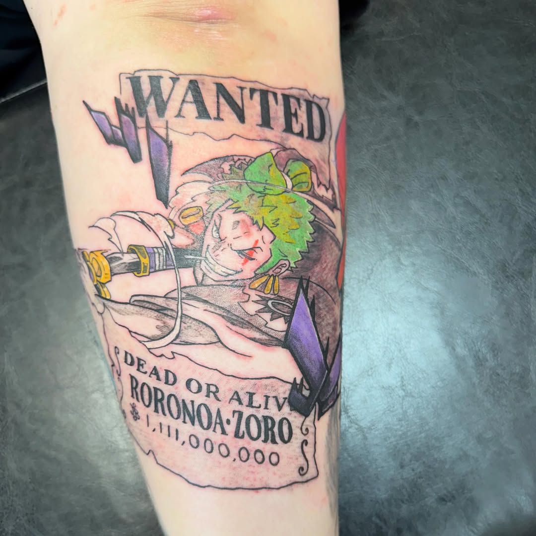 Roronoa Zoro wanted poster anime tattoo on the forearm by Jarvis Inkatsuki Ross