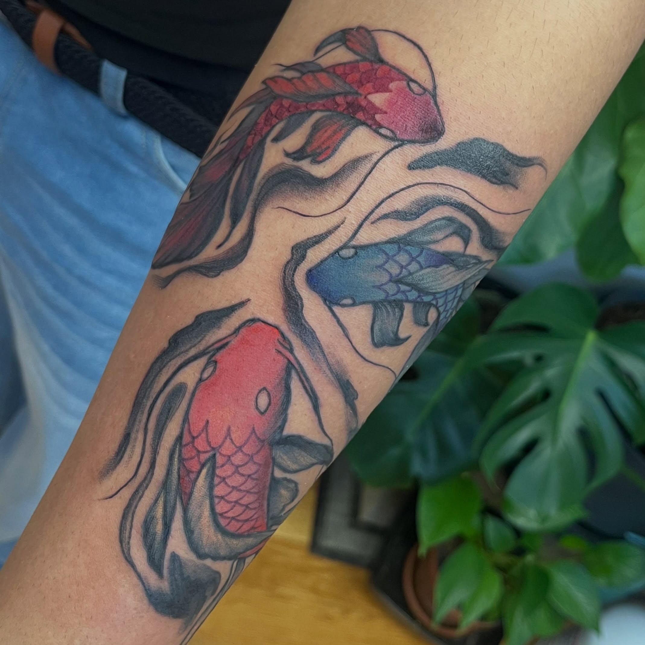 Koi fish japanese irezumi tattoo on the forearm by Garden Glow Tattoo