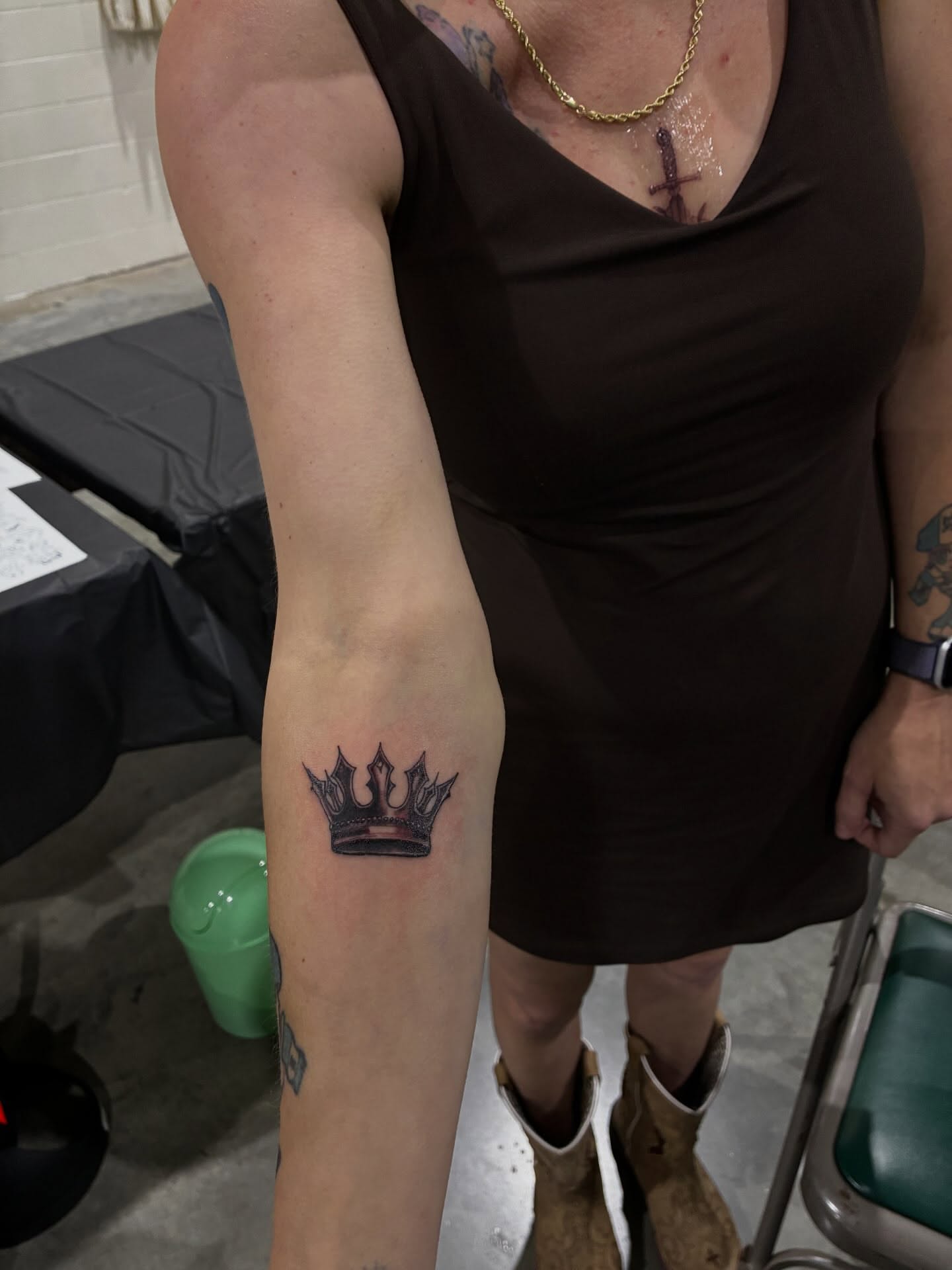 Crown black and grey tattoo on the forearm by Uno Inks