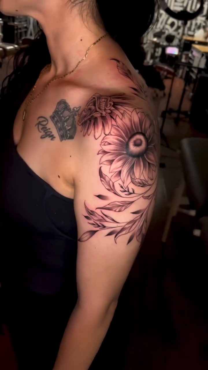 Sunflower and rose with script fine line tattoo on the shoulder by Nick Andrade Las Vegas Tattoo Artist