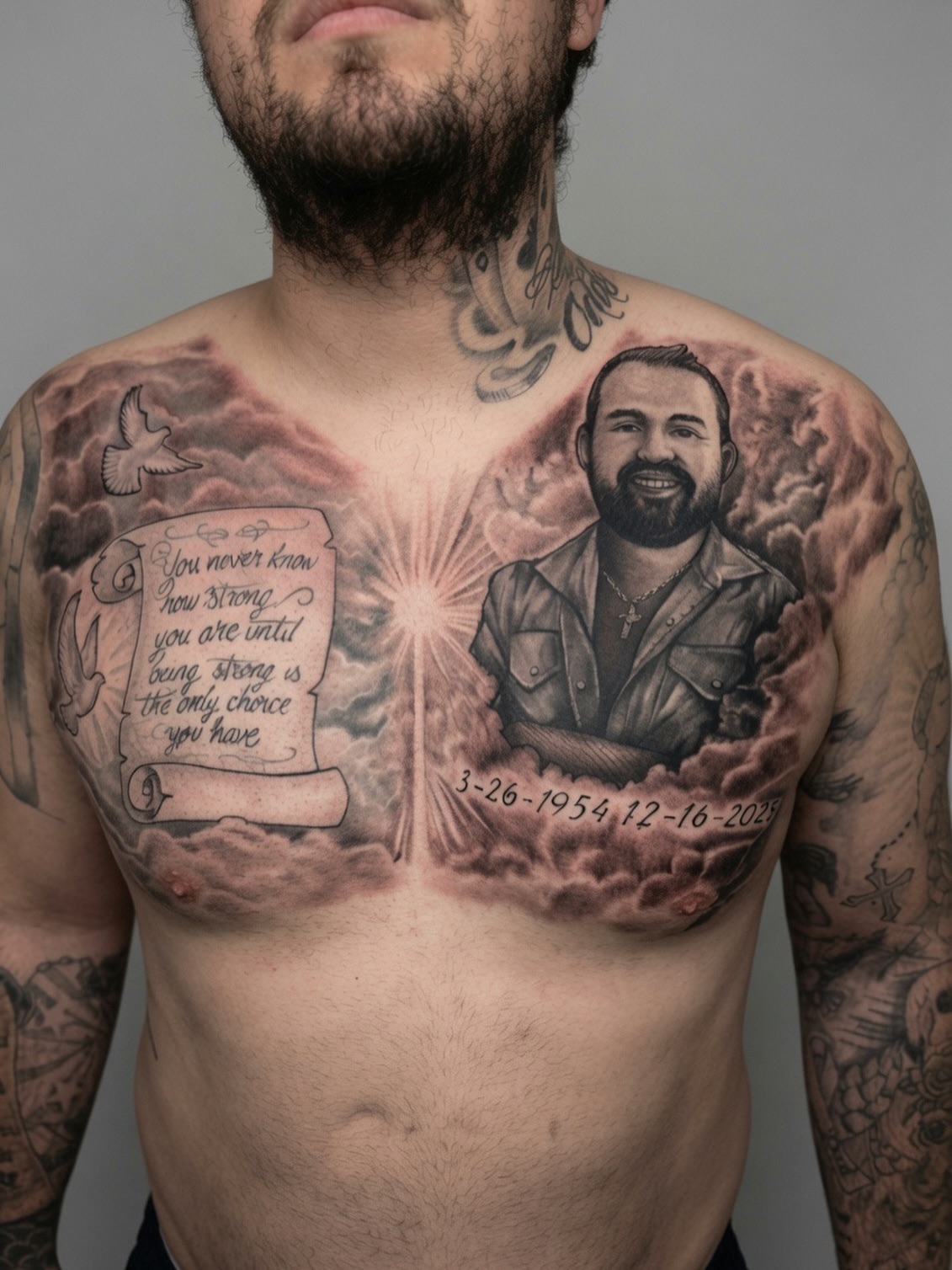 Portrait and scroll realism tattoo on the chest by Dmitrii Damoer, New York, New York