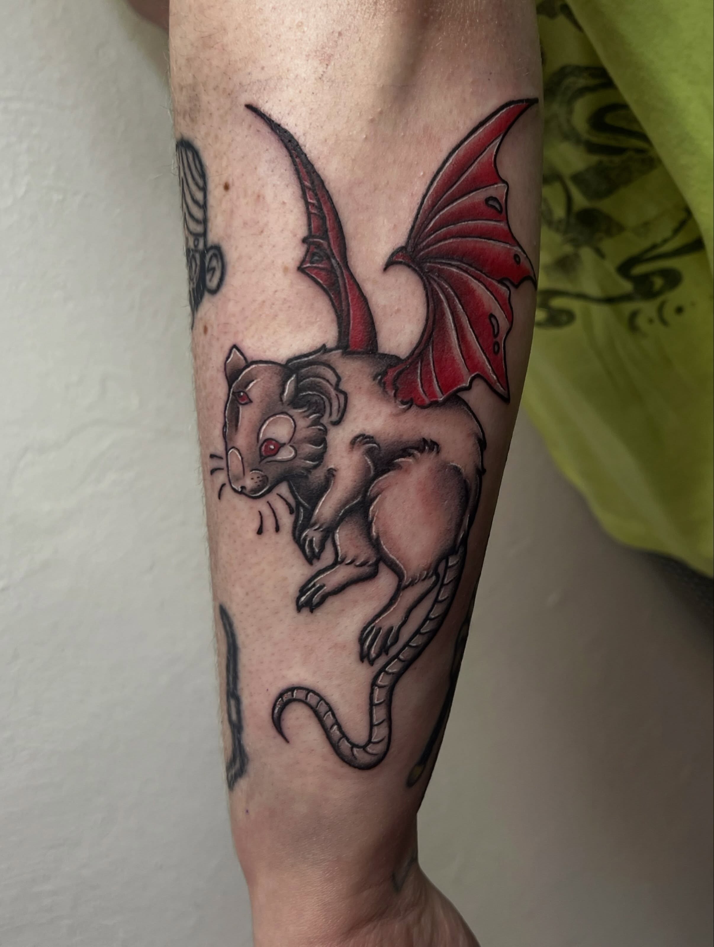 Gargoyle neo-traditional tattoo on the forearm by Amber Rose