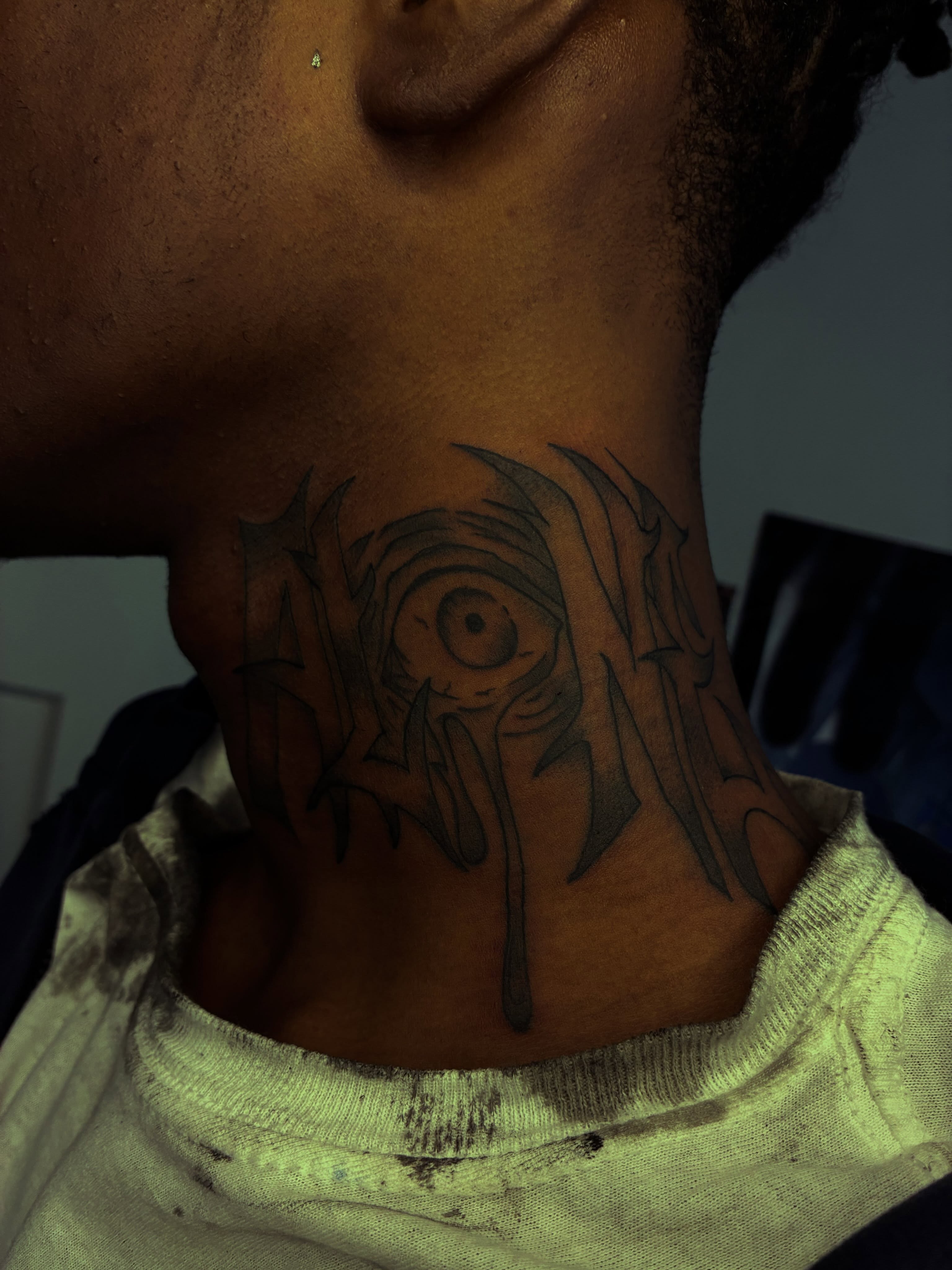 Eye tribal tattoo on the neck by ɪɪɴᴋᴇᴅʙʏʀᴇɴɴ🐉