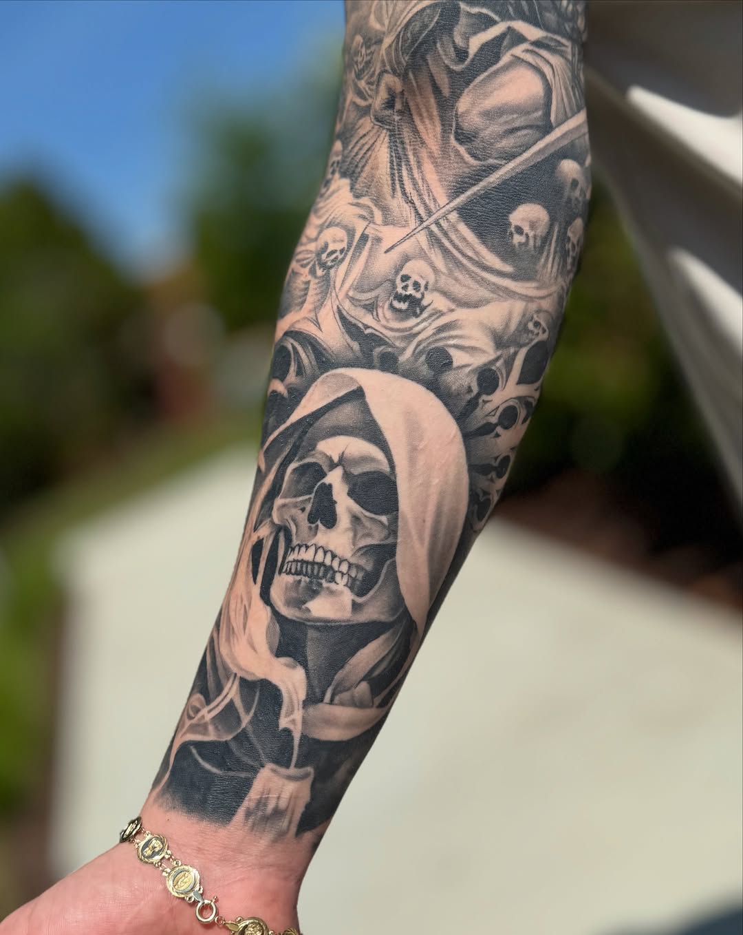 Tattoo by @heavyhitterbam — dark_realism, black_and_grey