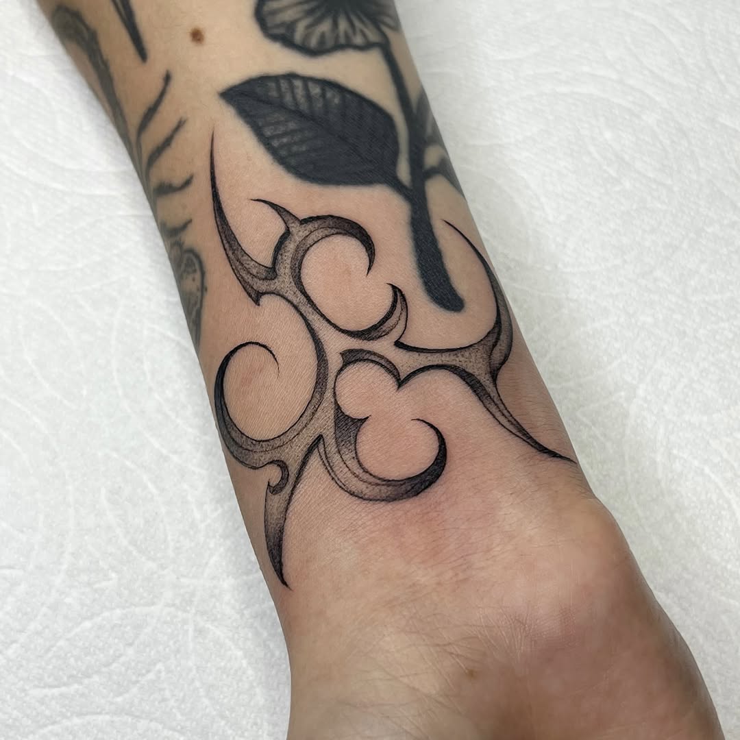 Tribal design cyber sigilism tattoo on the forearm by Sara Atamian, San Diego, California