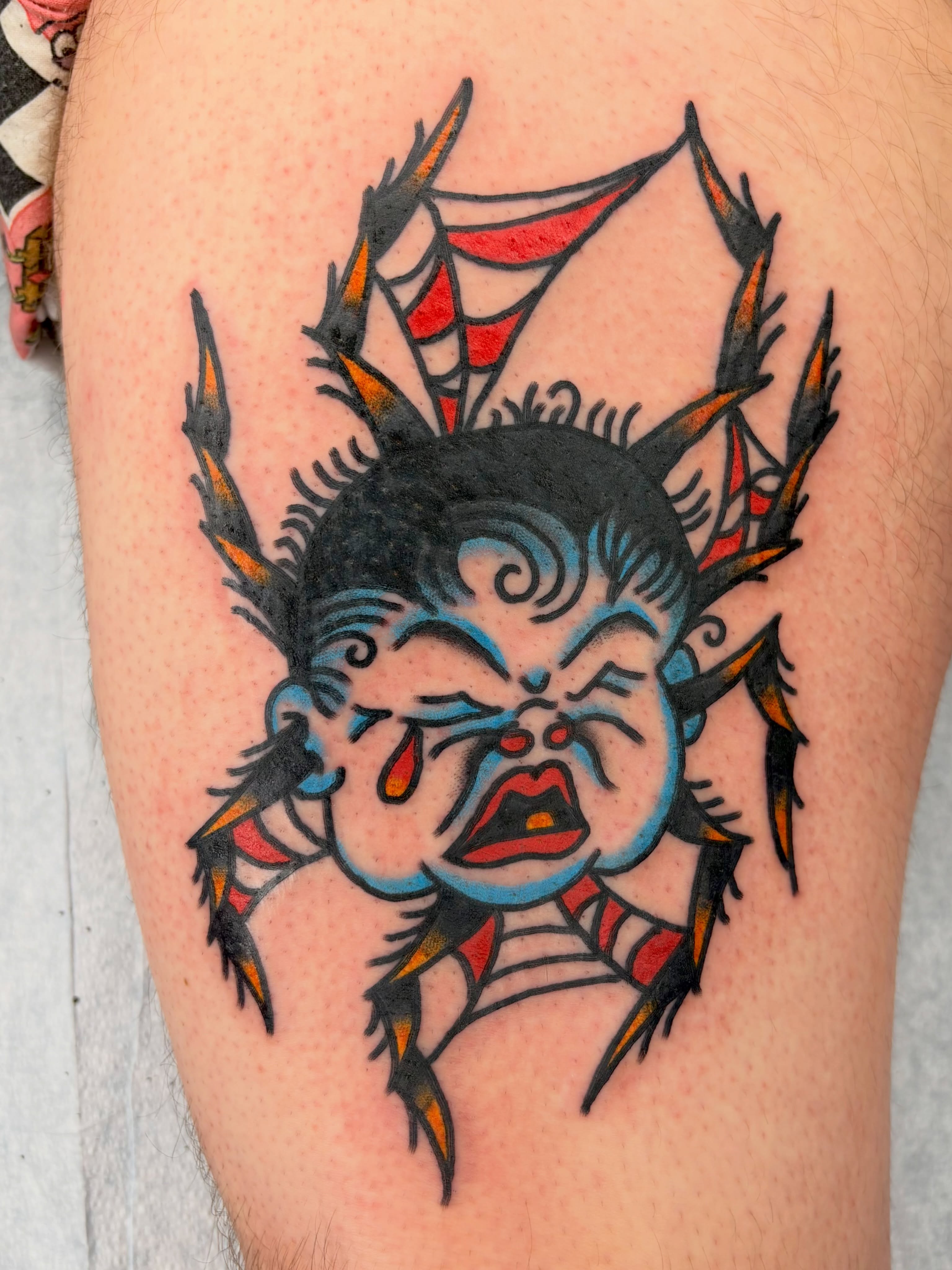 Demon head American traditional tattoo on the thigh by Braedon 🎱