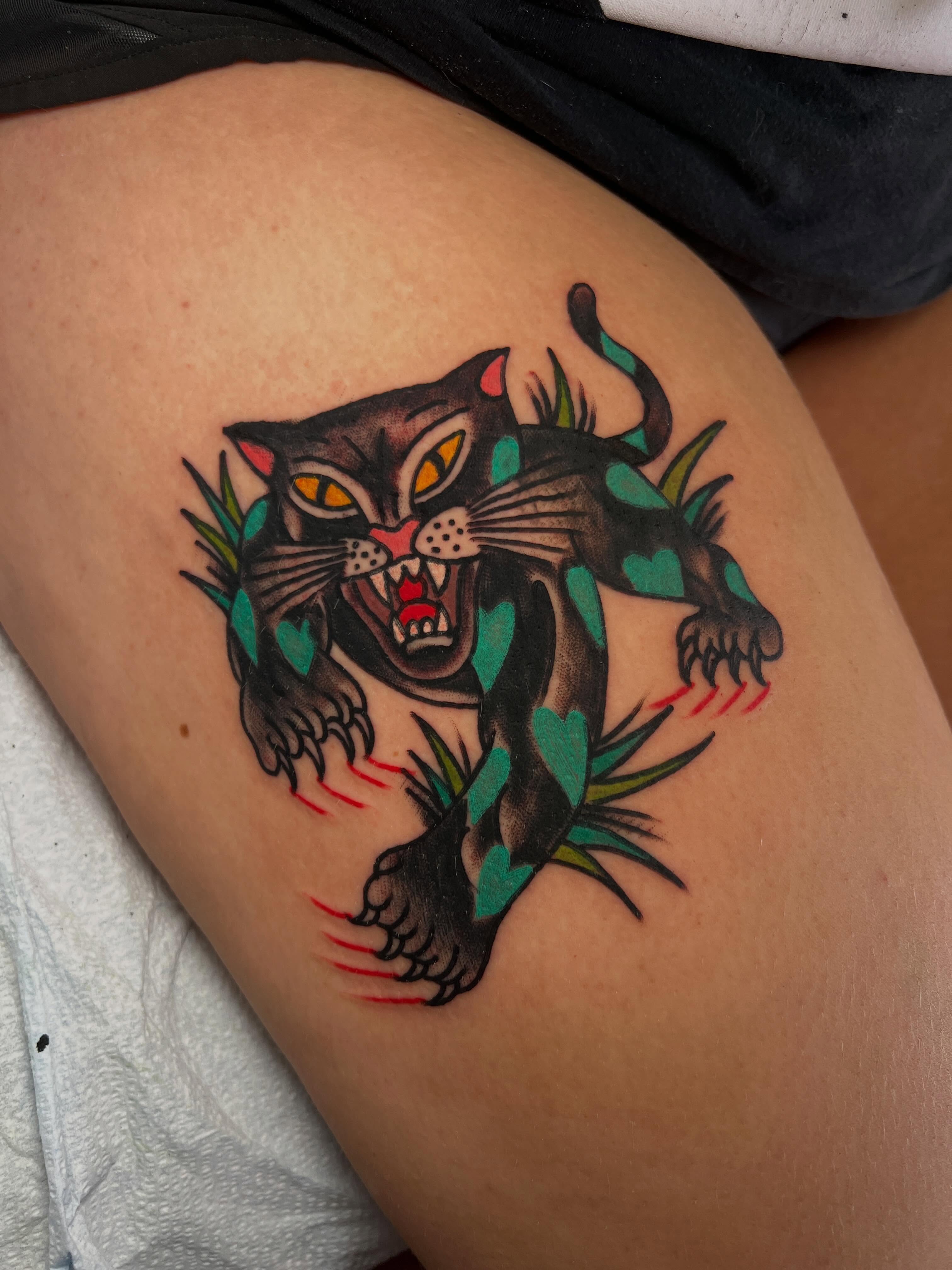 Panther American traditional tattoo on the thigh by Mat Helton, Fairborn, Ohio