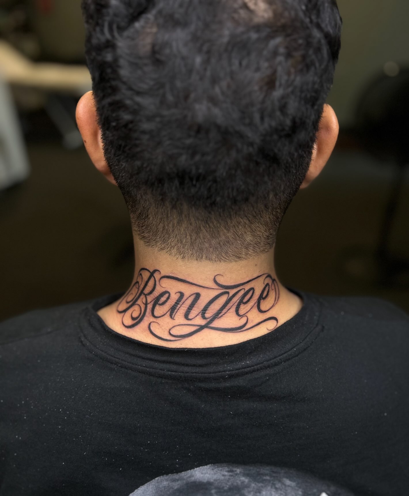 Script lettering lettering script tattoo on the neck by Tattoo Artist