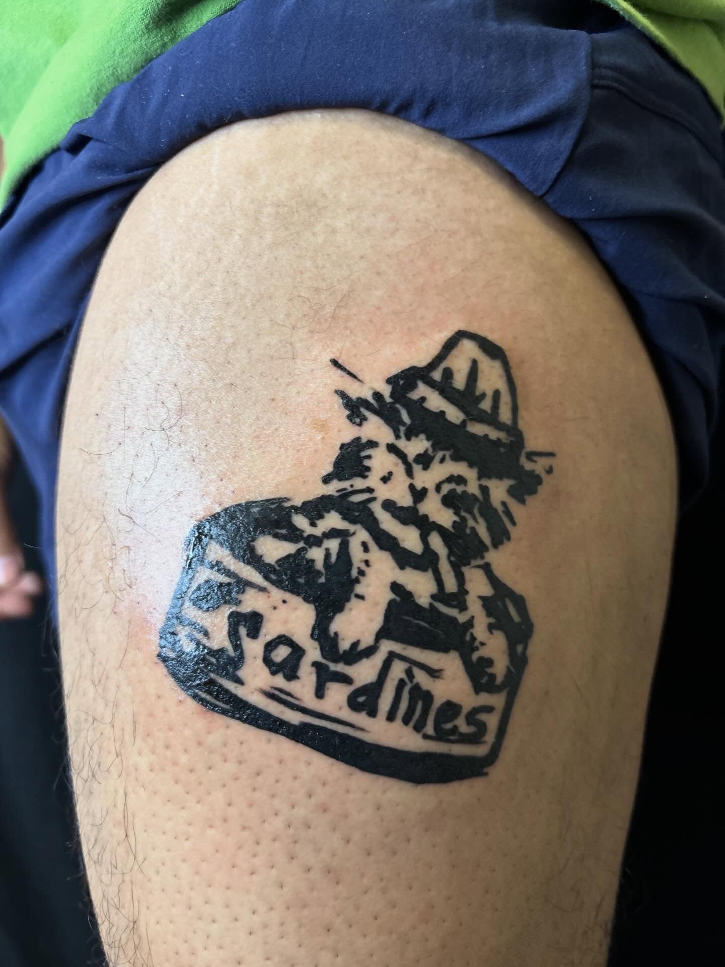 Sardine can black and grey tattoo on the shoulder by Pres!