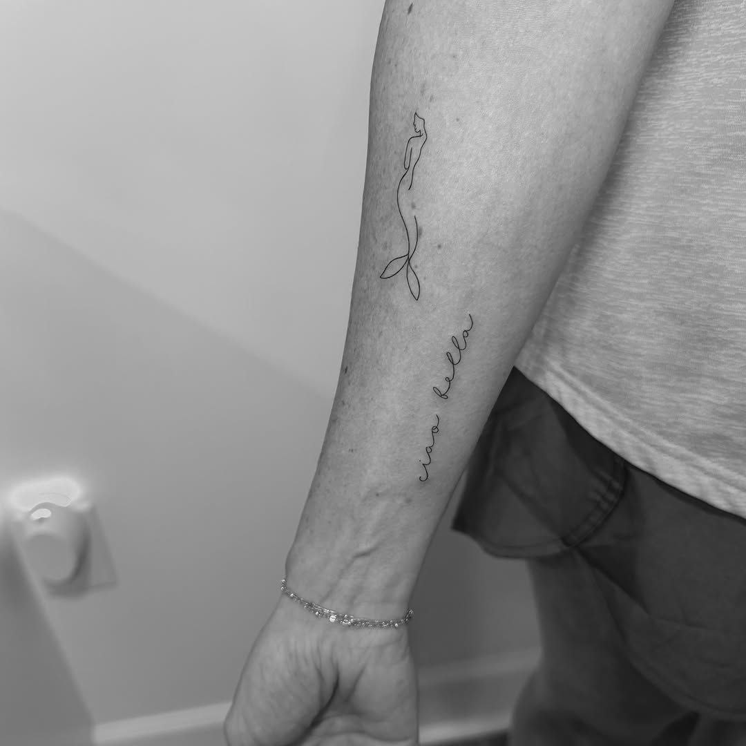 Woman silhouette fine line tattoo on the forearm by Jessica, Cheektowaga, New York