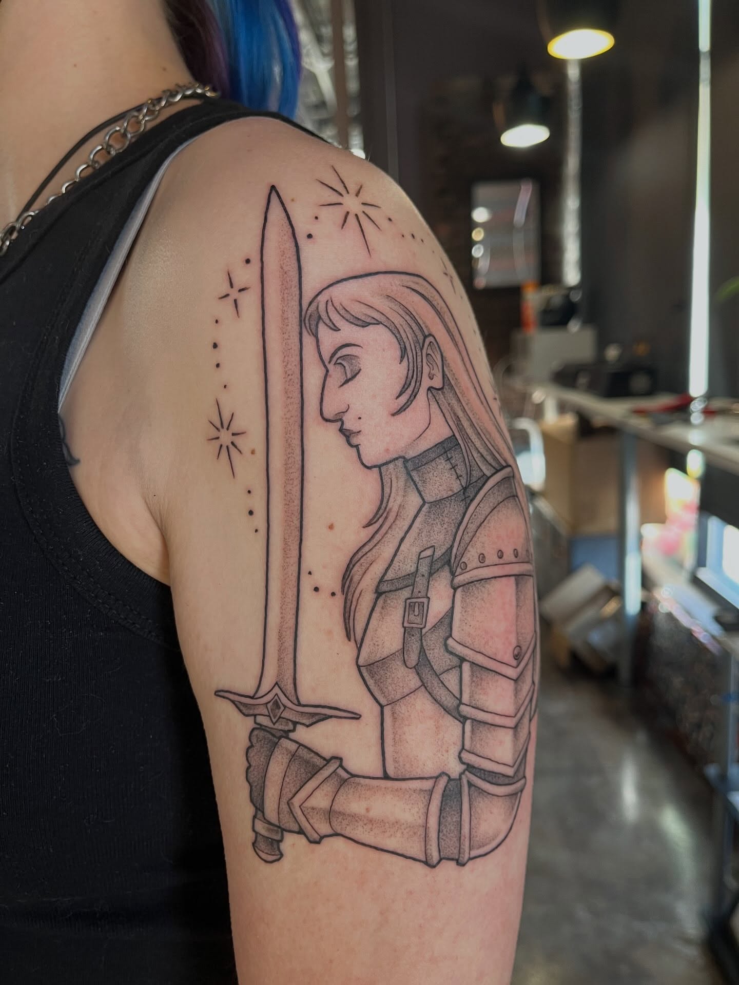 Female warrior dotwork tattoo on the shoulder by bunny, Minneapolis, Minnesota