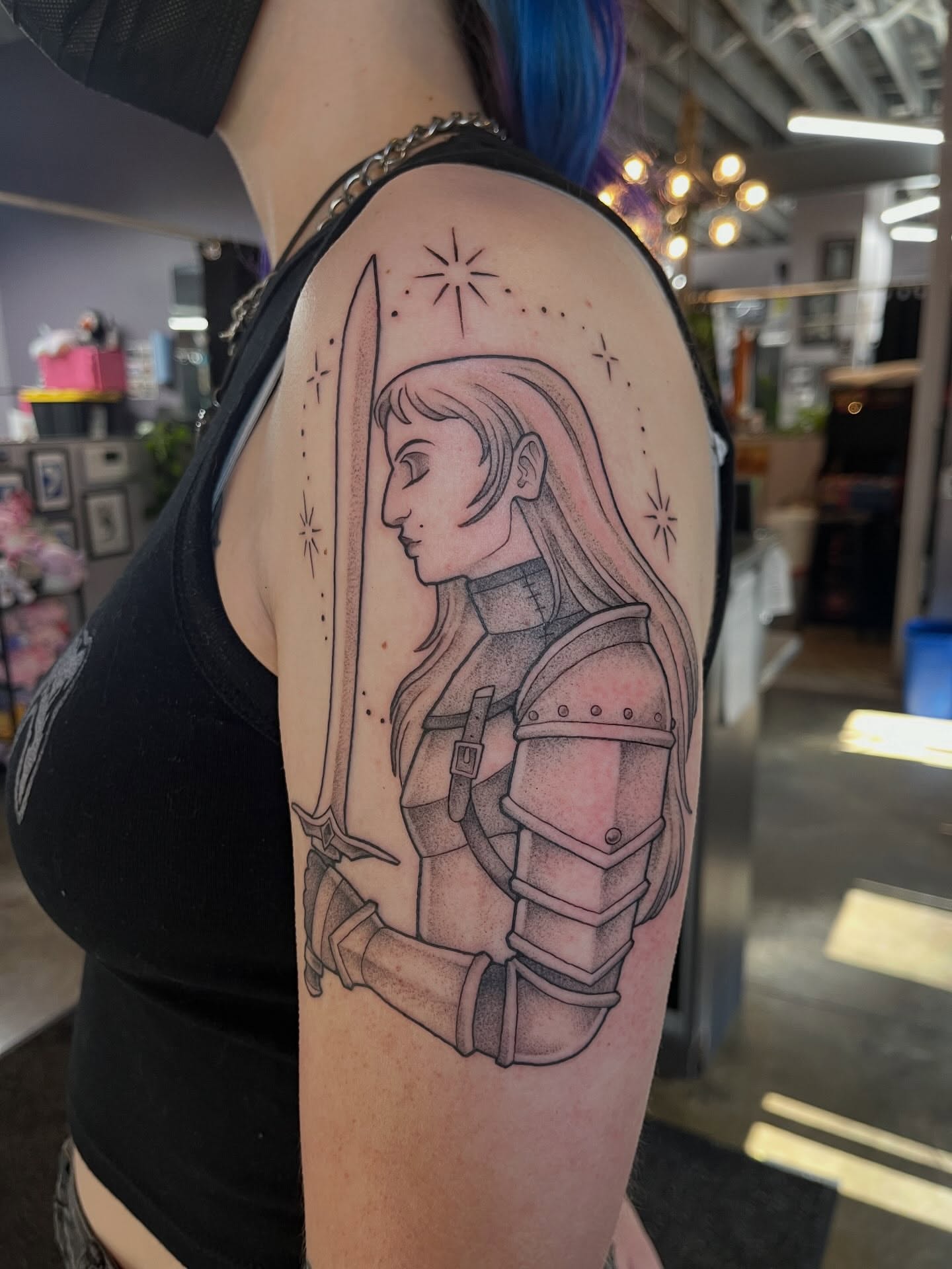 Female knight realism tattoo on the shoulder by bunny, Minneapolis, Minnesota