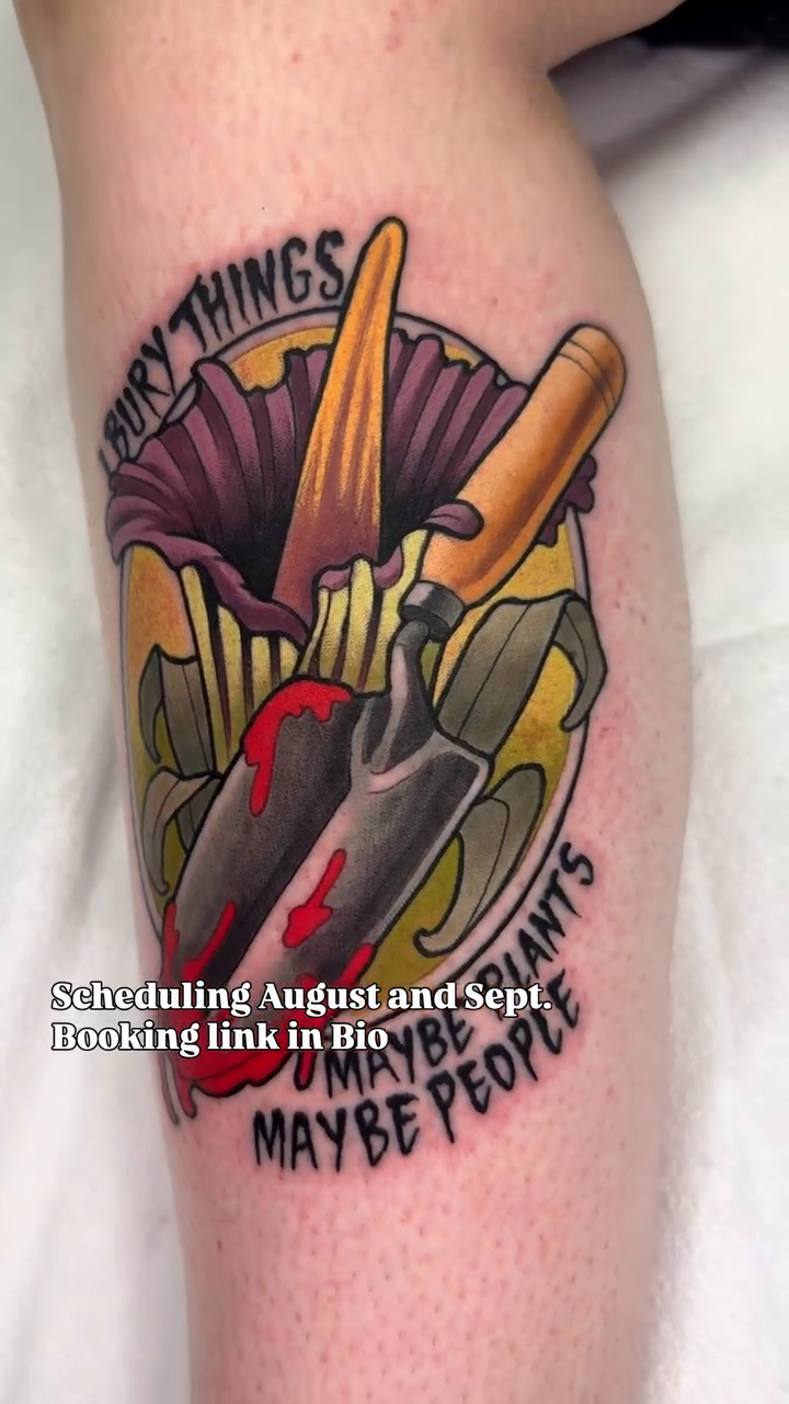 Gardening tools and flower with text American traditional tattoo on the upper arm by Kiel Ferrari