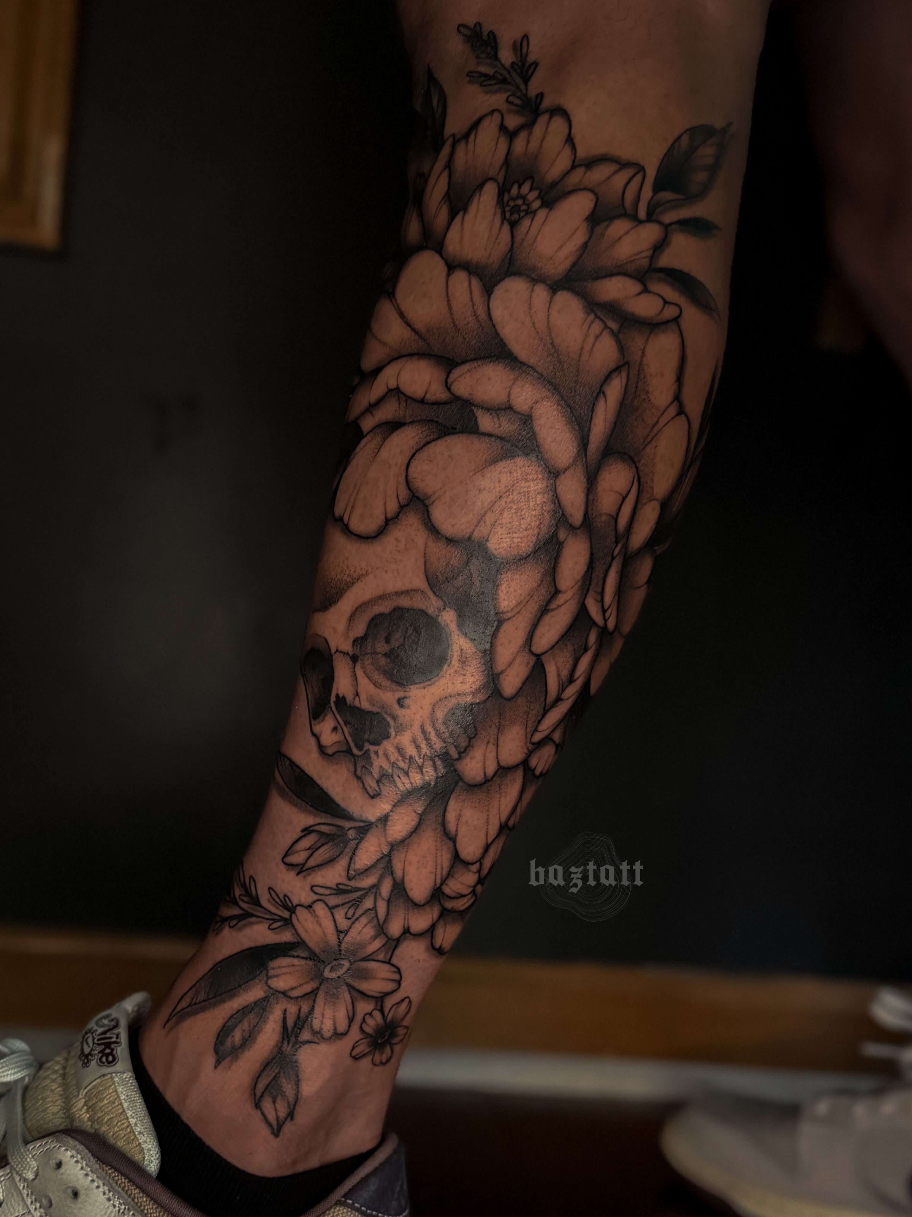 Skull and flowers realism tattoo on the forearm by bri allura ✿ tattoo artist  ✿ cleveland, oh