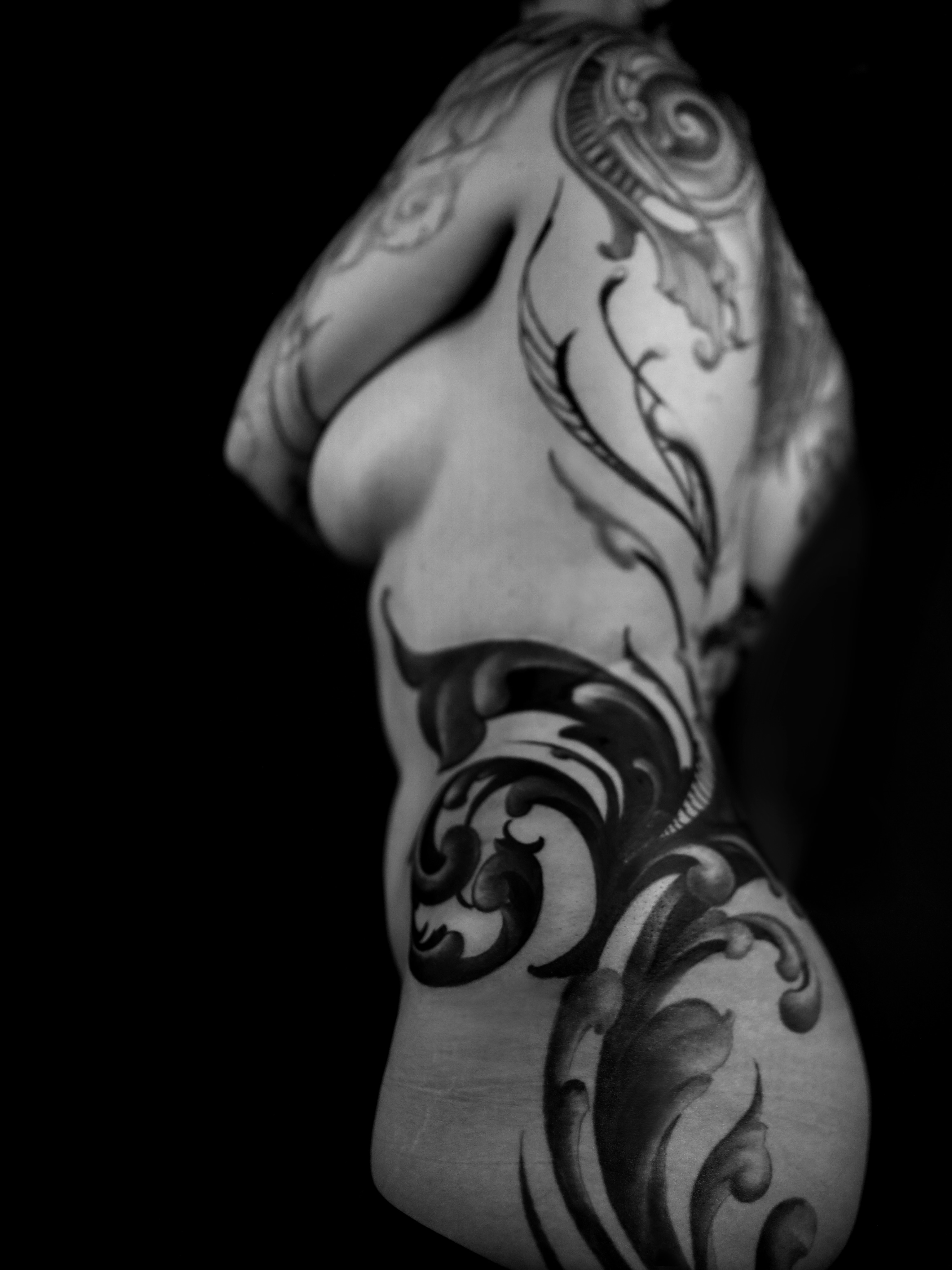 Floral ornamental tattoo on the back by ➕d U S T I N C H A R L e S➕, Seattle, Washington