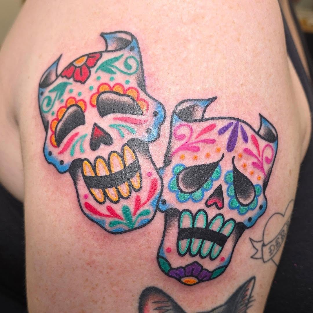 Sugar skulls Chicano tattoo on the shoulder by A. Teixeira, Los Angeles, California