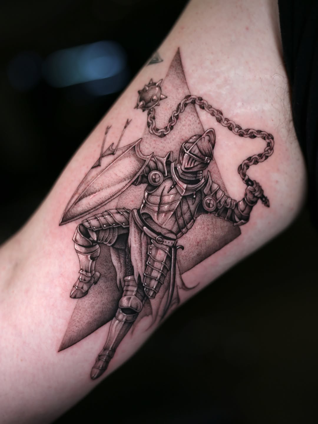 Knight with flail and shield realism tattoo on the forearm by Steve Franciosa