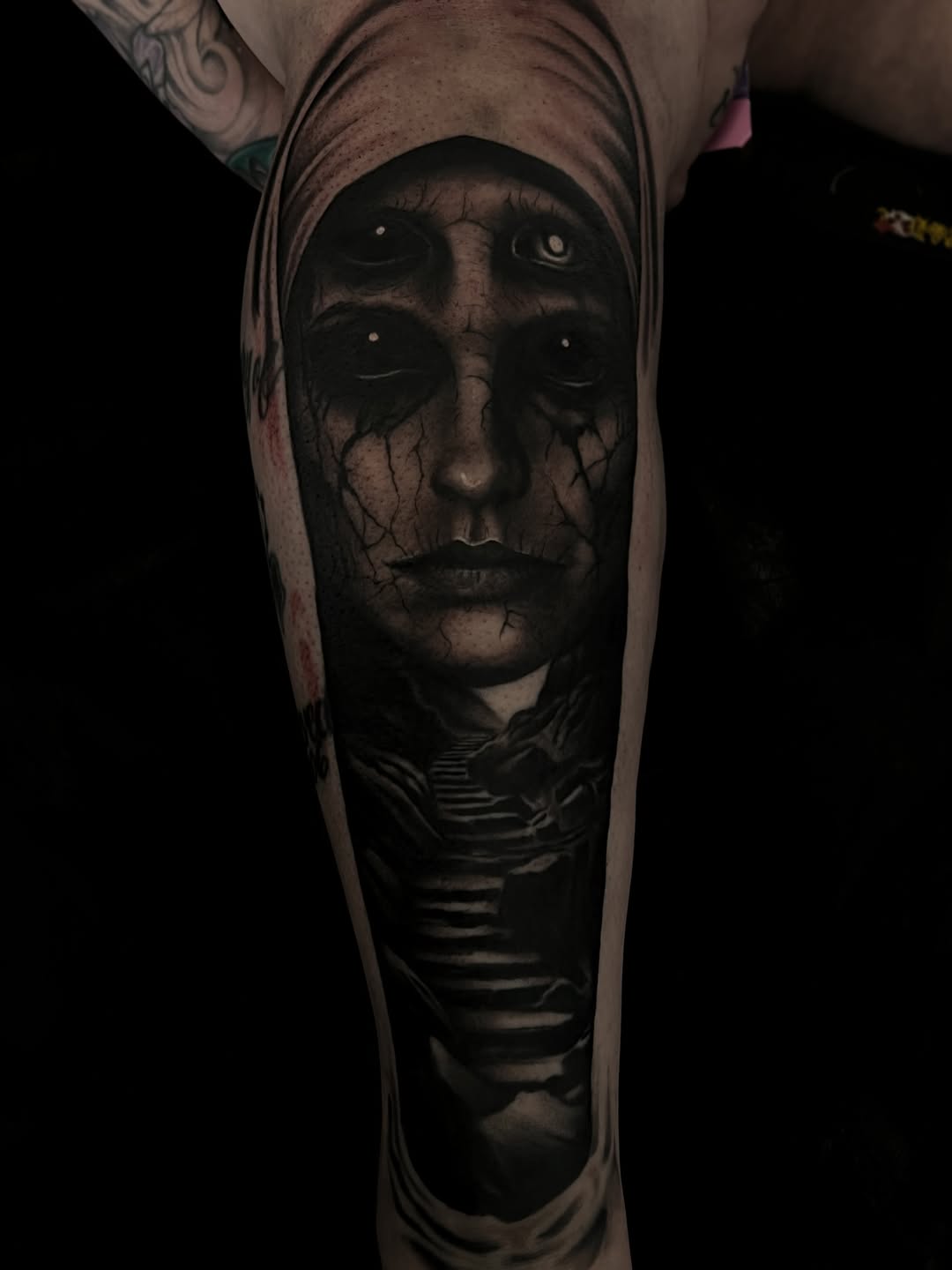 Tattoo by @nickbridwelltattoo — dark_realism, black_and_grey