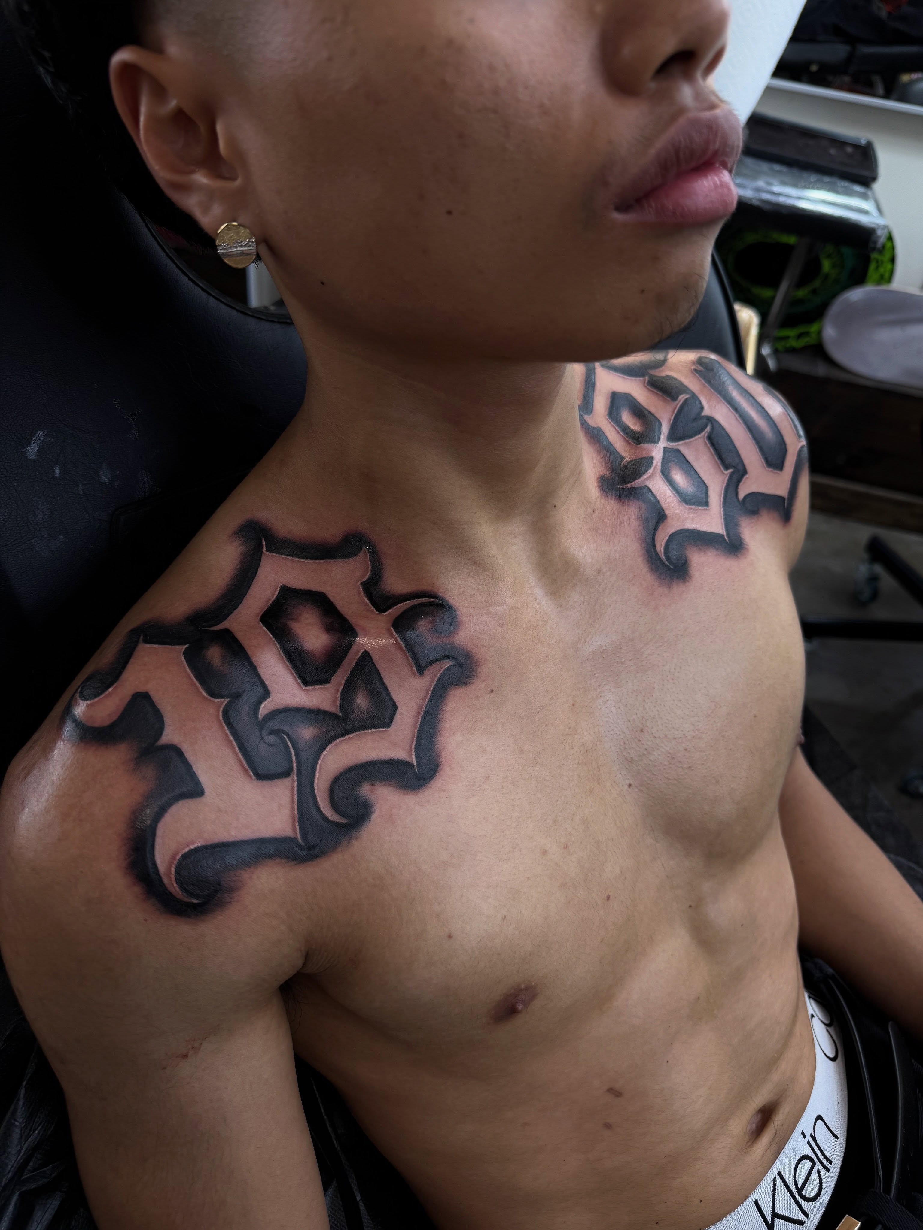 Geometric geometric tattoo on the shoulder by @samg_tat2s, San Diego, California