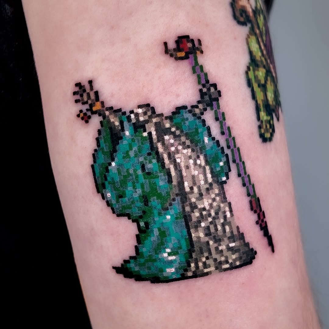 Tattoo by @mrpixel.tattooer — anime, pixel_art
