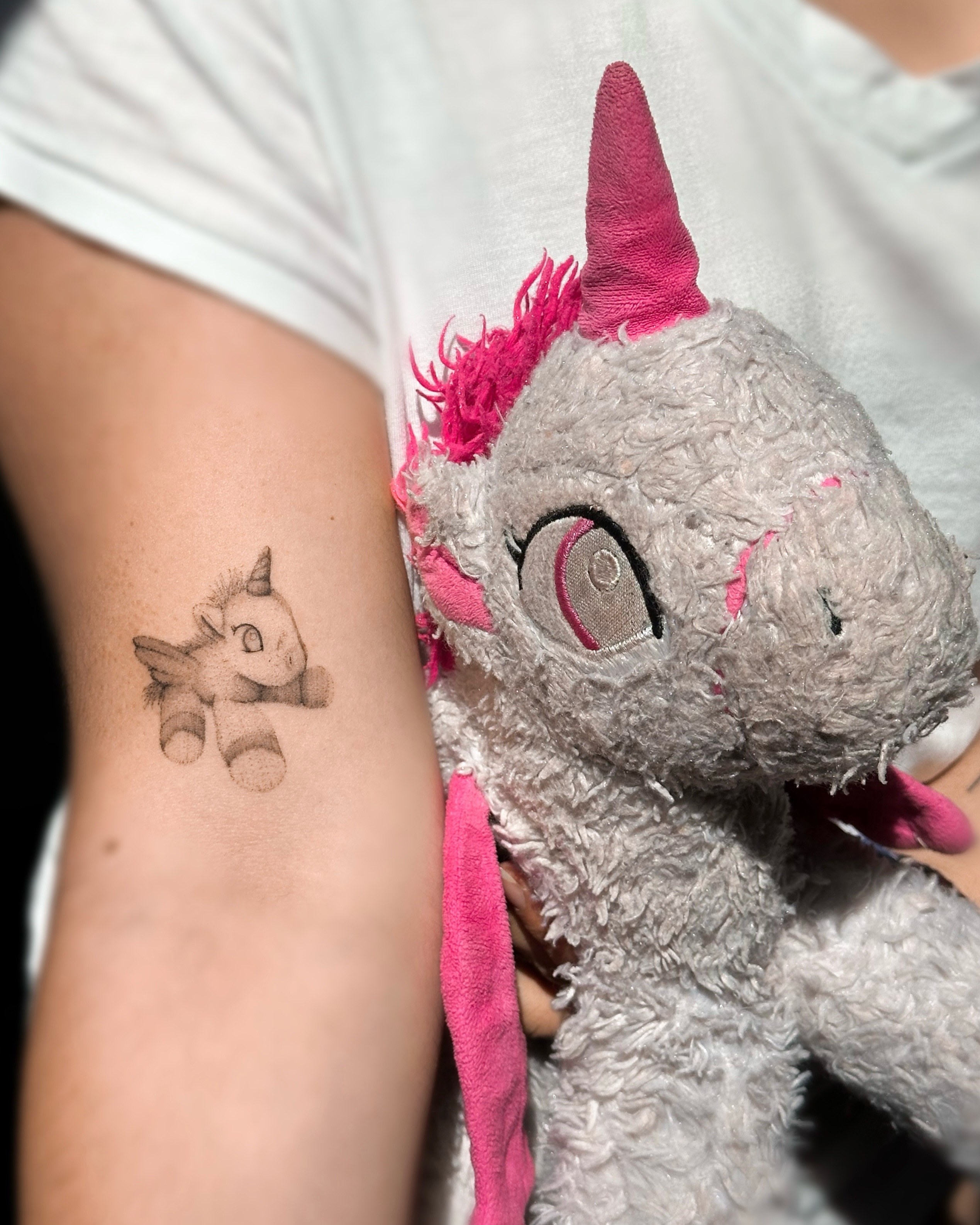Unicorn black and grey tattoo on the forearm by Mila, Riga, Latvia