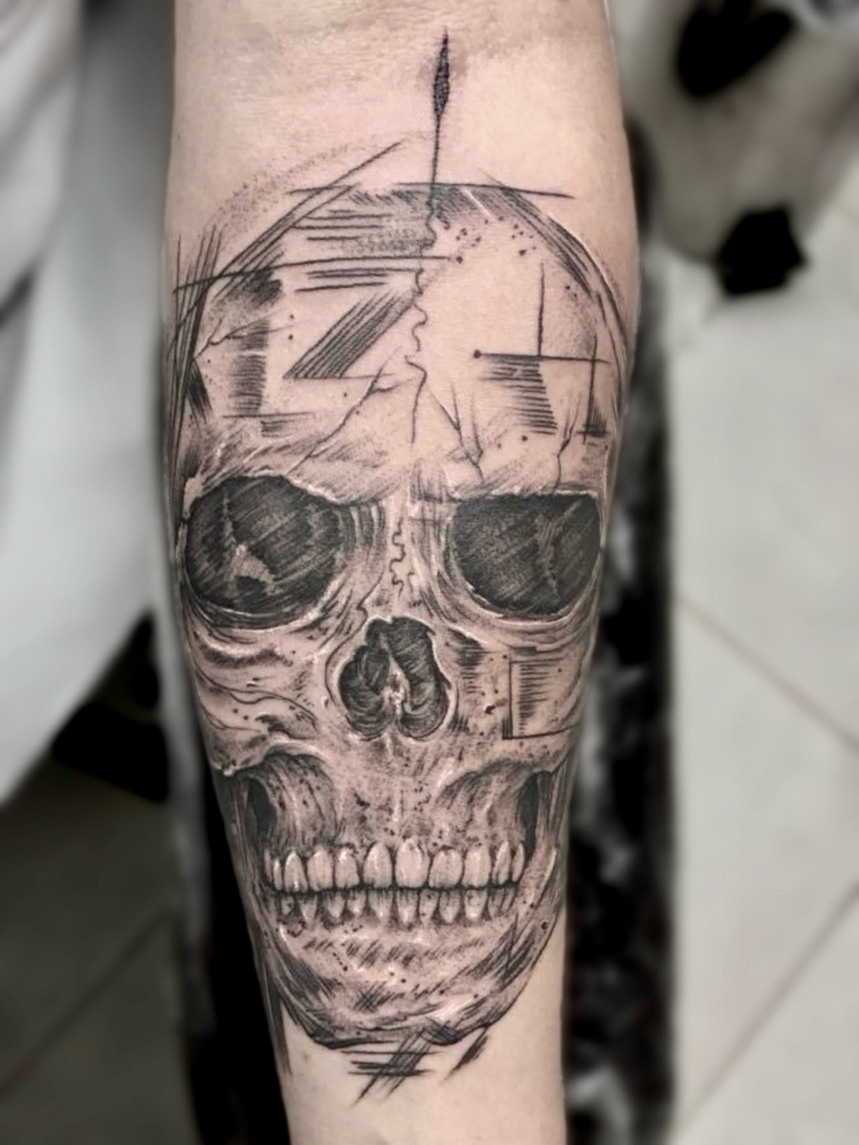 Skull realism tattoo on the forearm by @luckybunnytat2