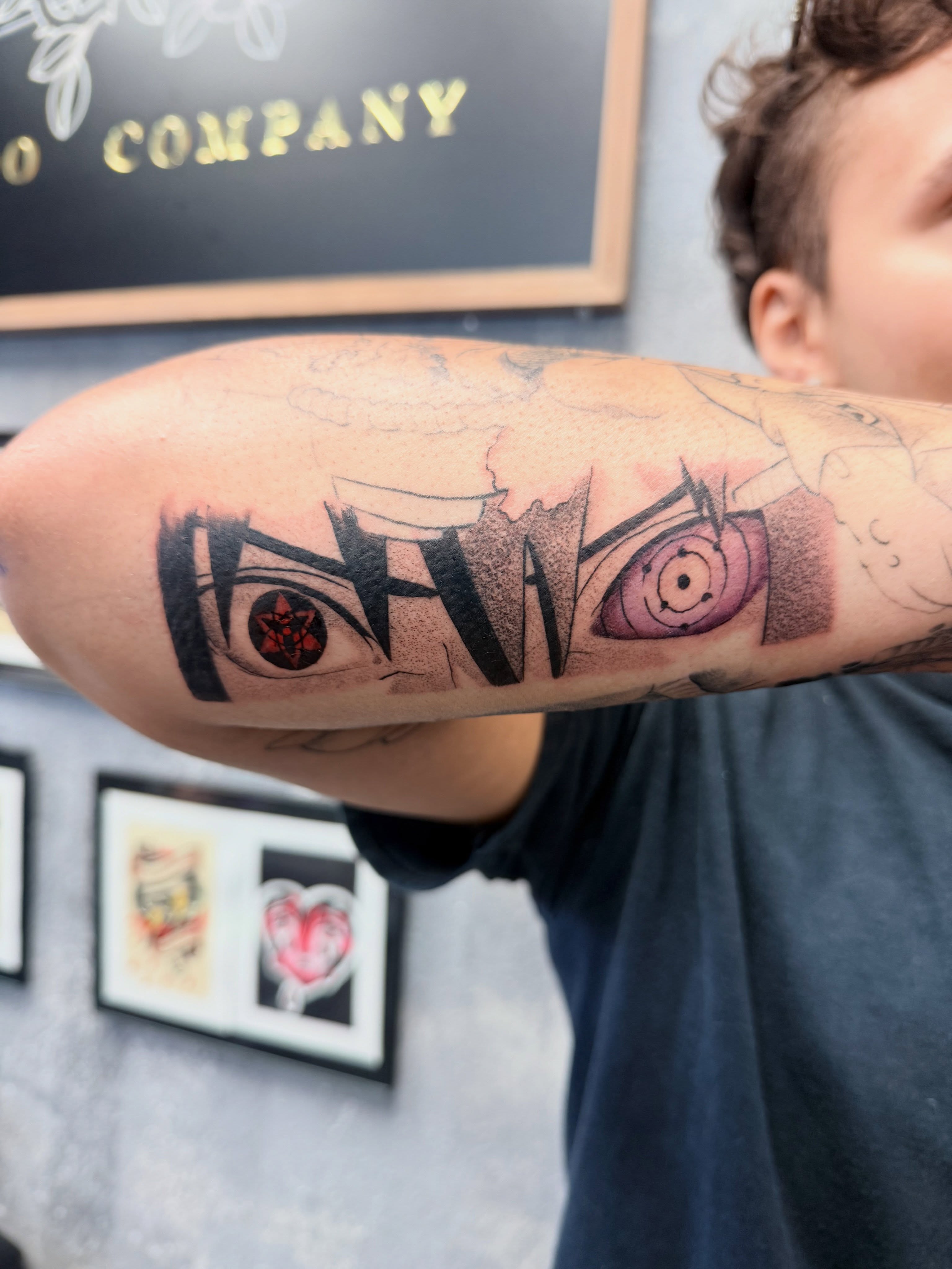 Eye black and grey tattoo on the forearm by Chris