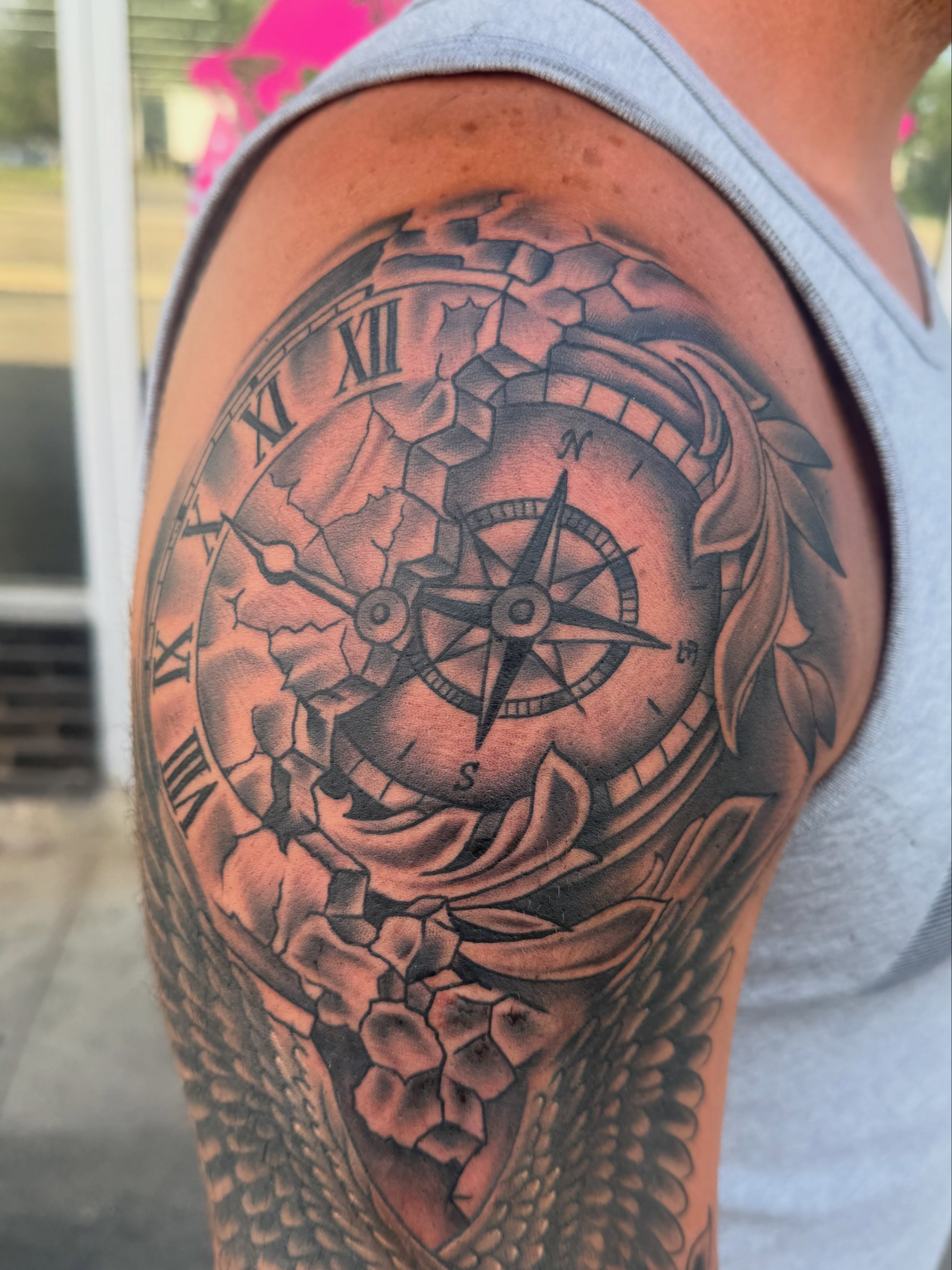 Compass and clock black and grey tattoo on the shoulder by Jake Horstman, Dayton, Ohio