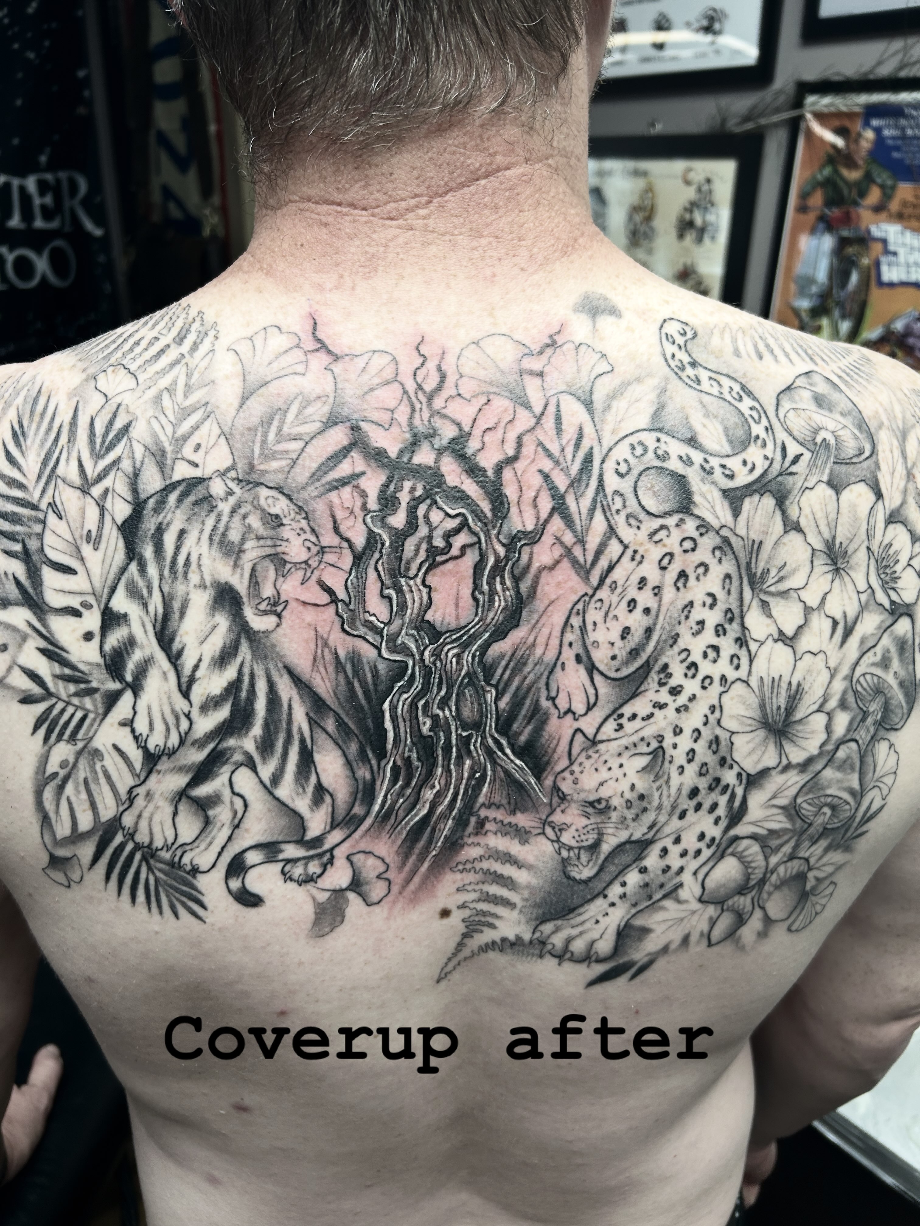 Jungle animals realism tattoo on the back by Dan Schuster