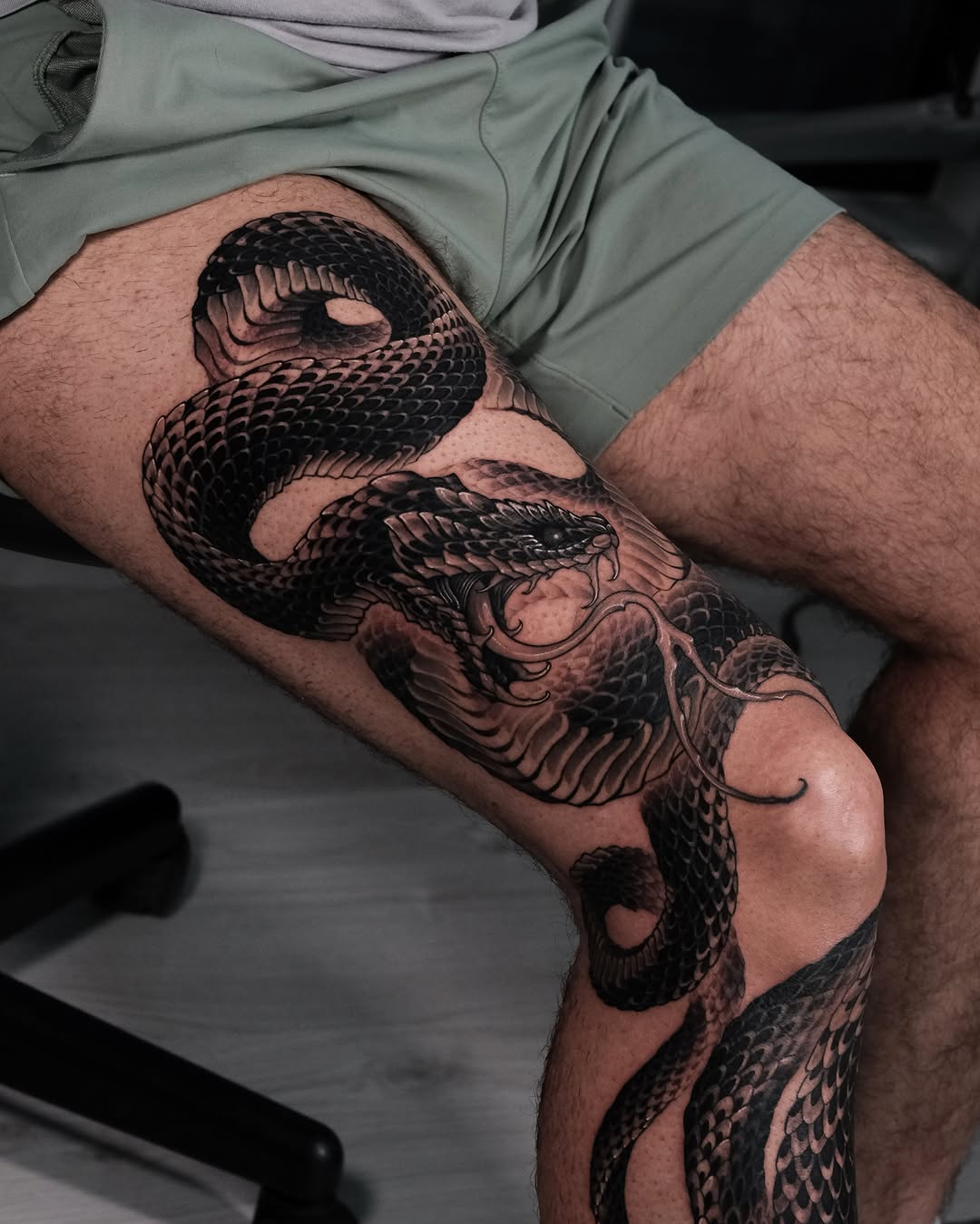 Snake Japanese tattoo on the thigh by Yujin Ju