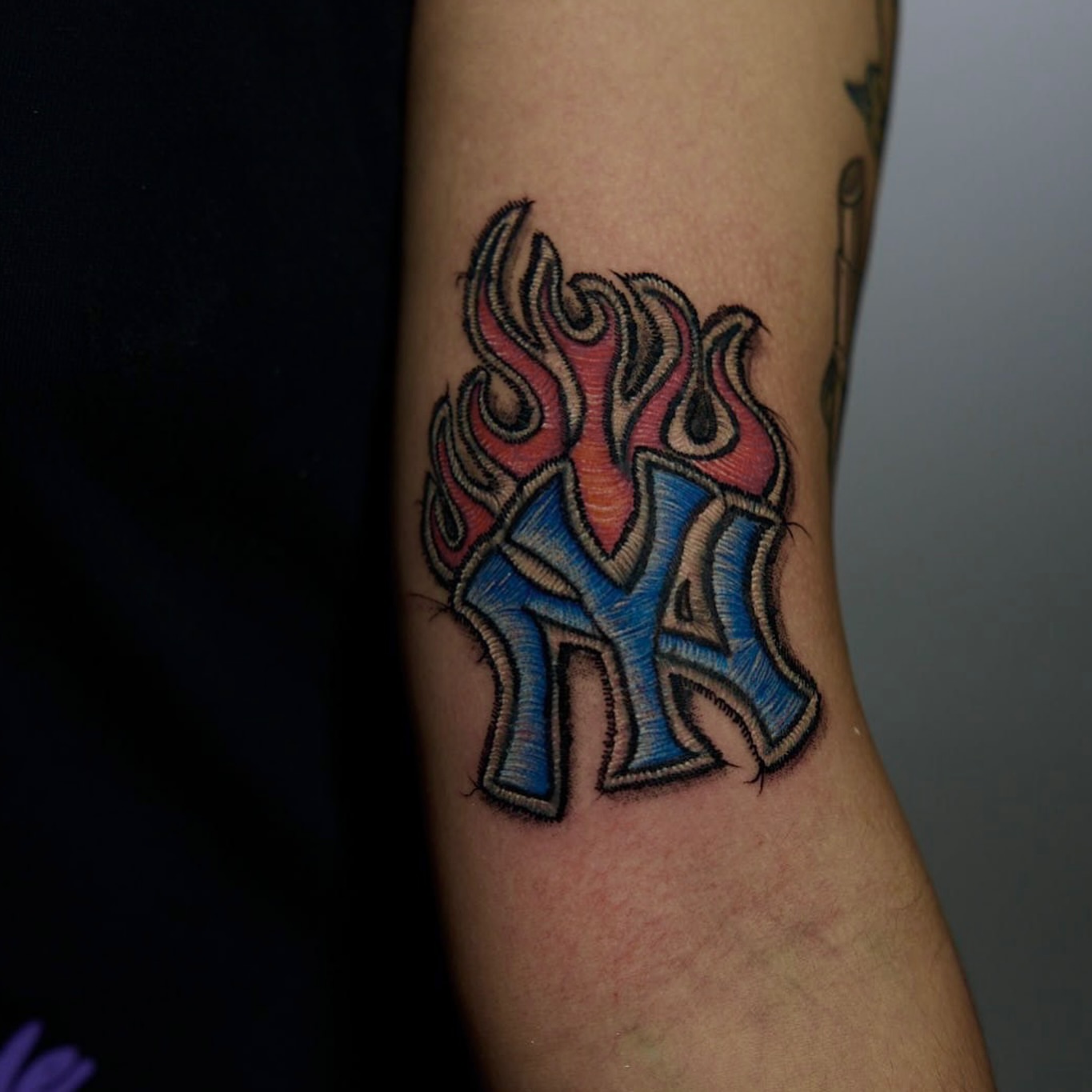 NY Yankees logo new school tattoo on the forearm by Fabian Hellberg