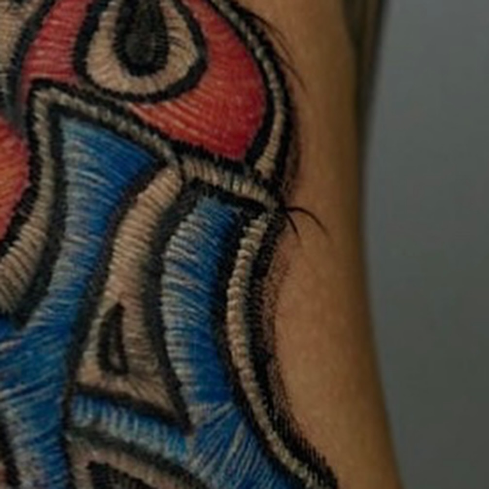 Bird American traditional tattoo on the forearm by Fabian Hellberg