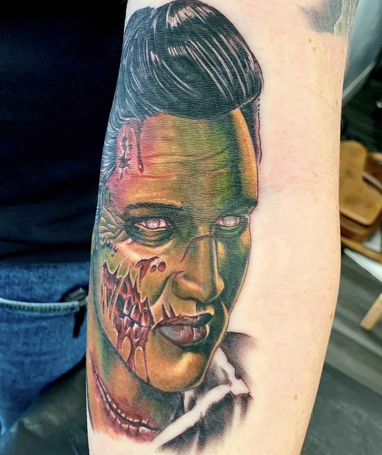 Zombie face realism tattoo on the forearm by Skott Kautman, Dubuque, Iowa