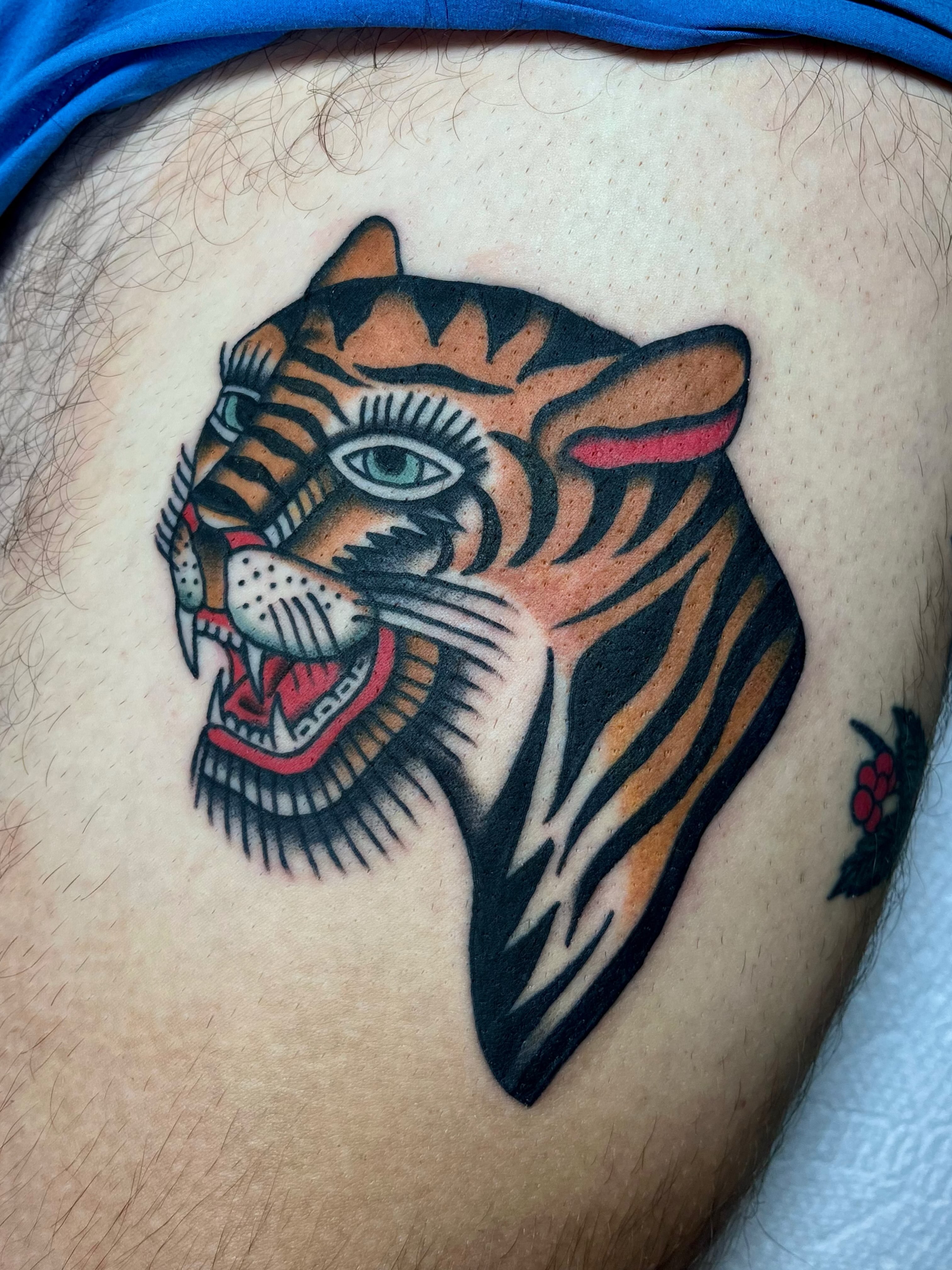 Tiger head American traditional tattoo on the thigh by Elizabeth Summers ❨・¨⬮ Traditional Tattoo