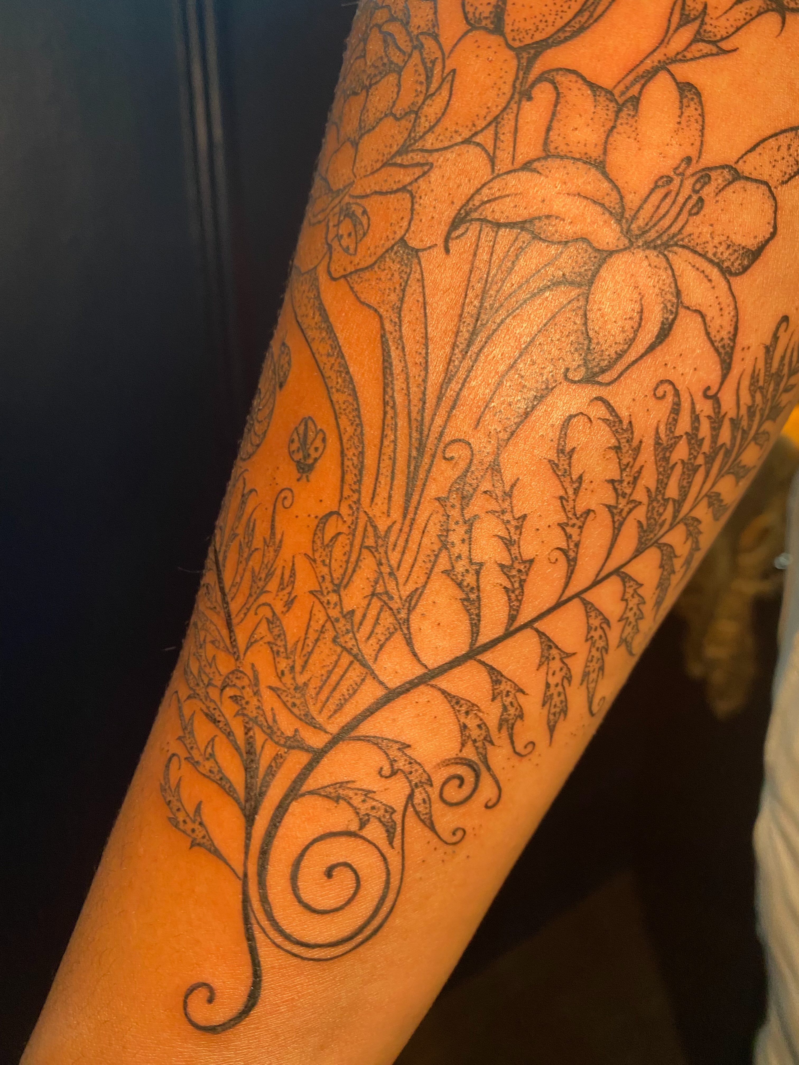 Floral bouquet dotwork tattoo on the forearm by Jesikah Rapp