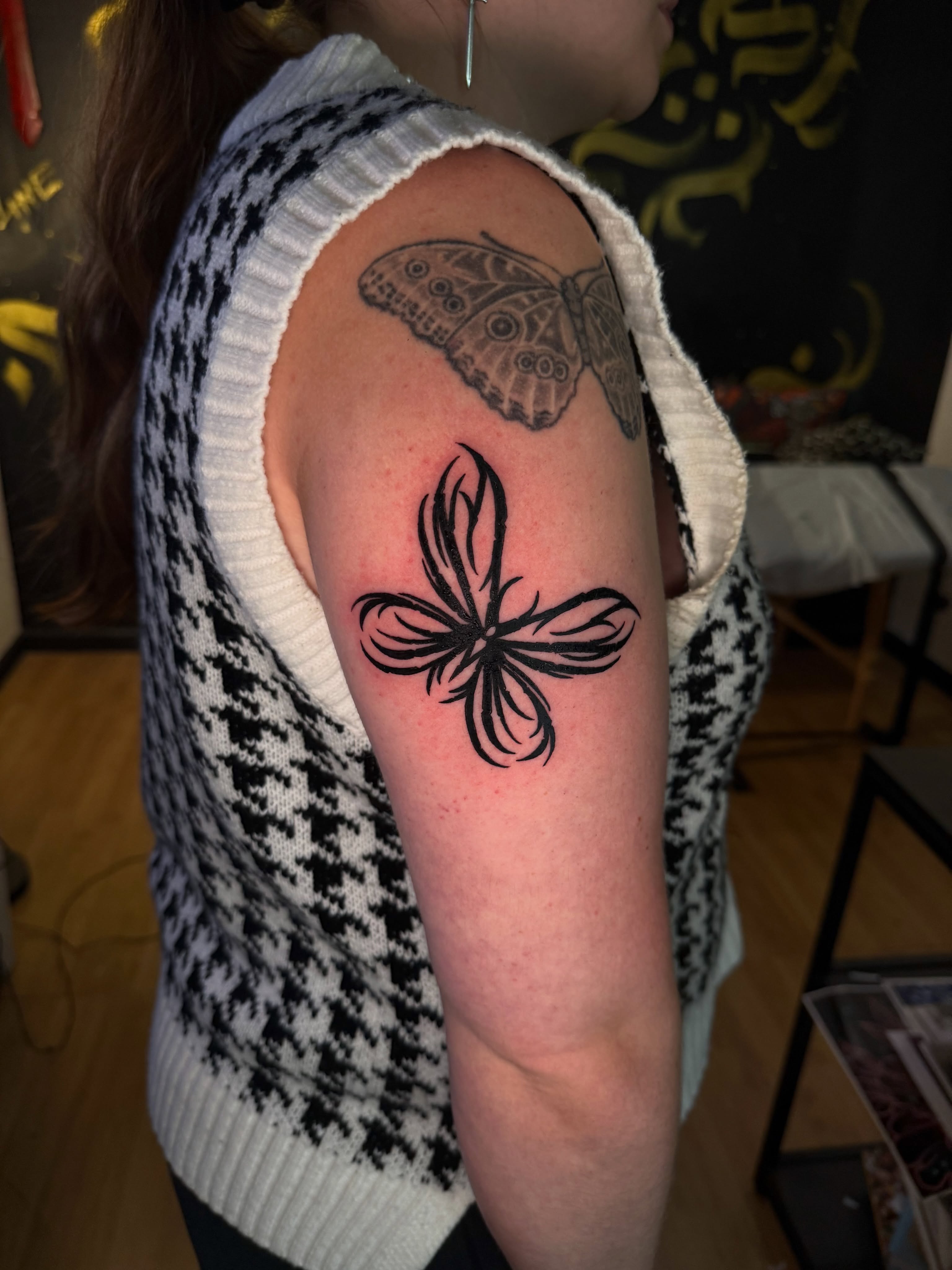 Butterfly black and grey tattoo on the forearm by Yassin alsaje