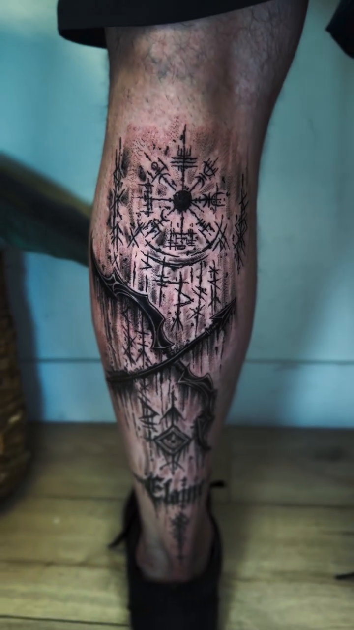 Viking compass and forest scene blackwork tattoo on the calf by Monica Gonzalez