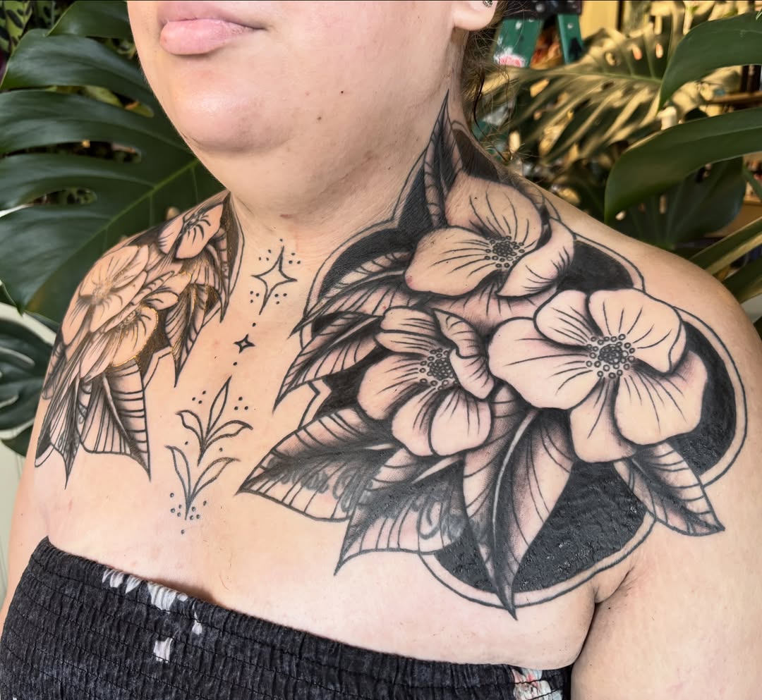 Flowers and leaves dotwork tattoo on the chest by Alex Green, Nashville, Tennessee