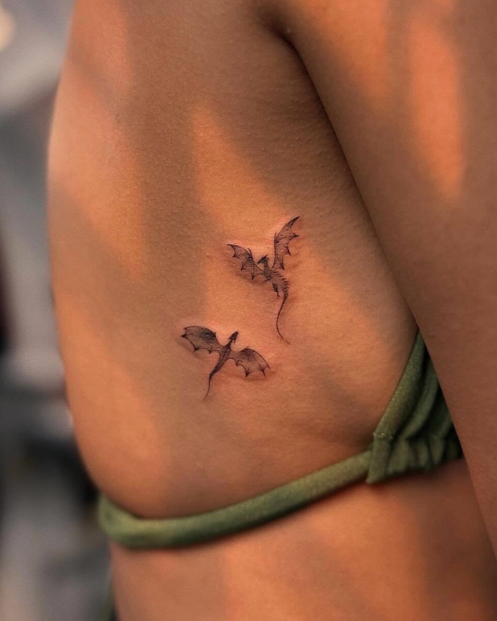 Bats dotwork tattoo on the ribs by Ellie