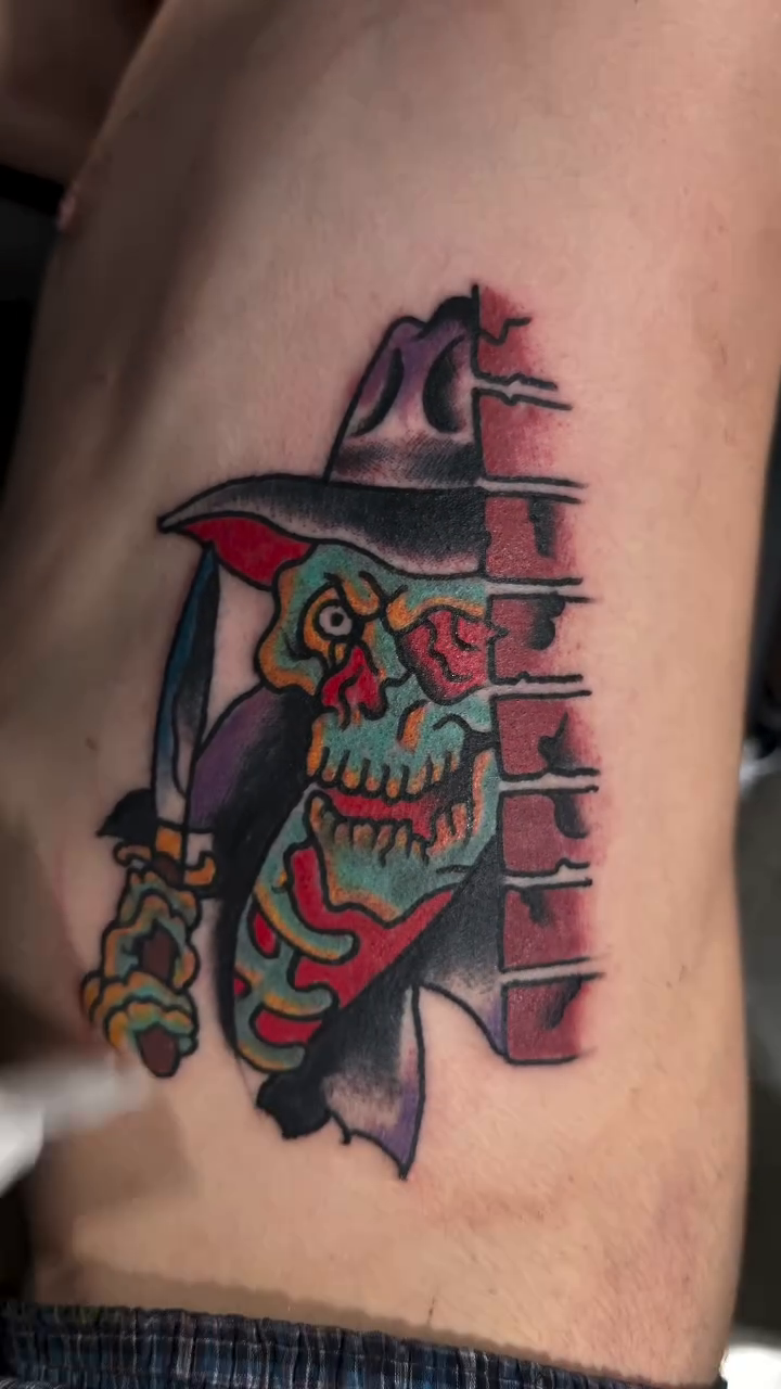 American traditional tattoo on the thigh by Don Lee