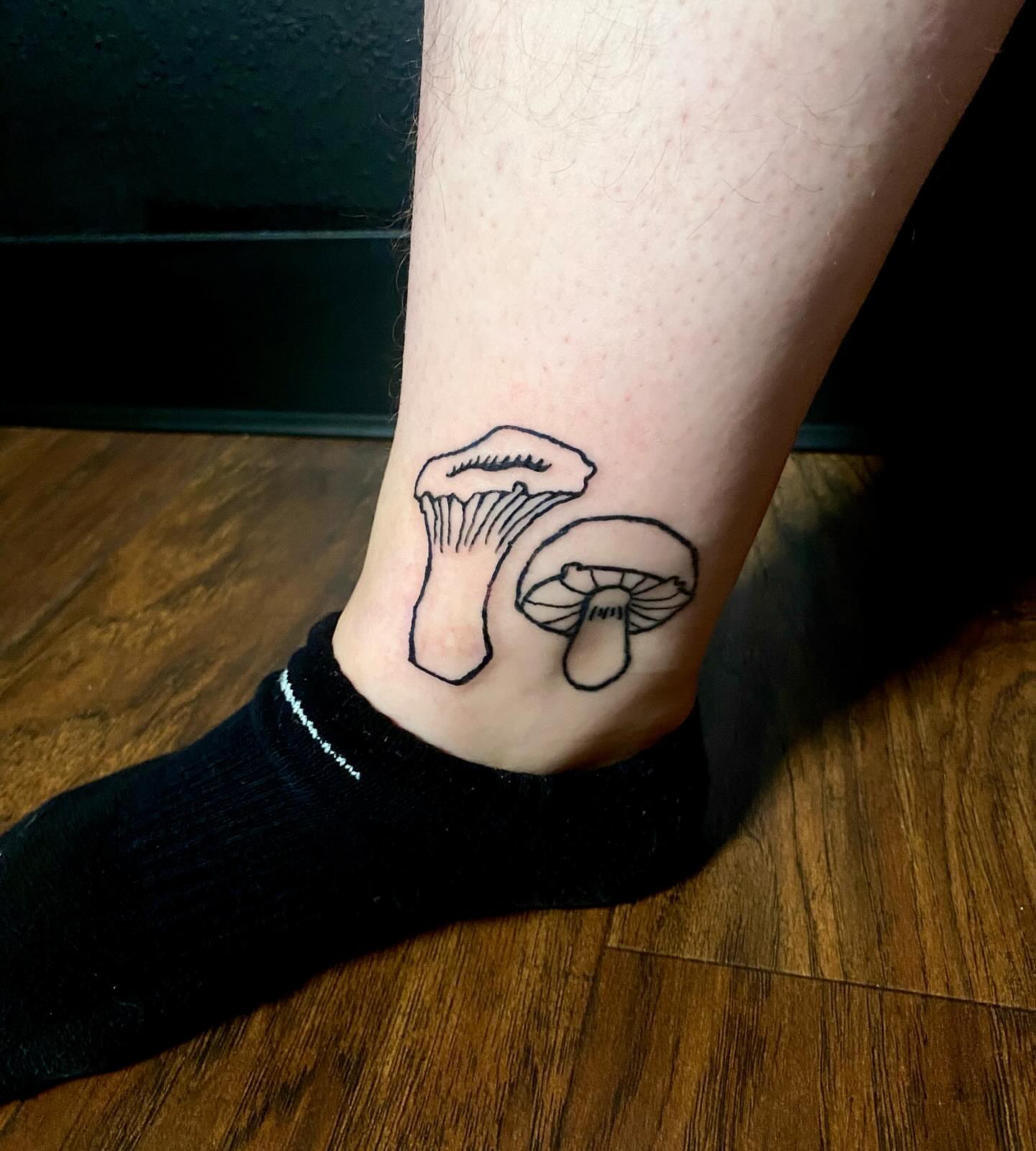 Mushrooms black and grey tattoo on the foot by ollie, Portland, Oregon